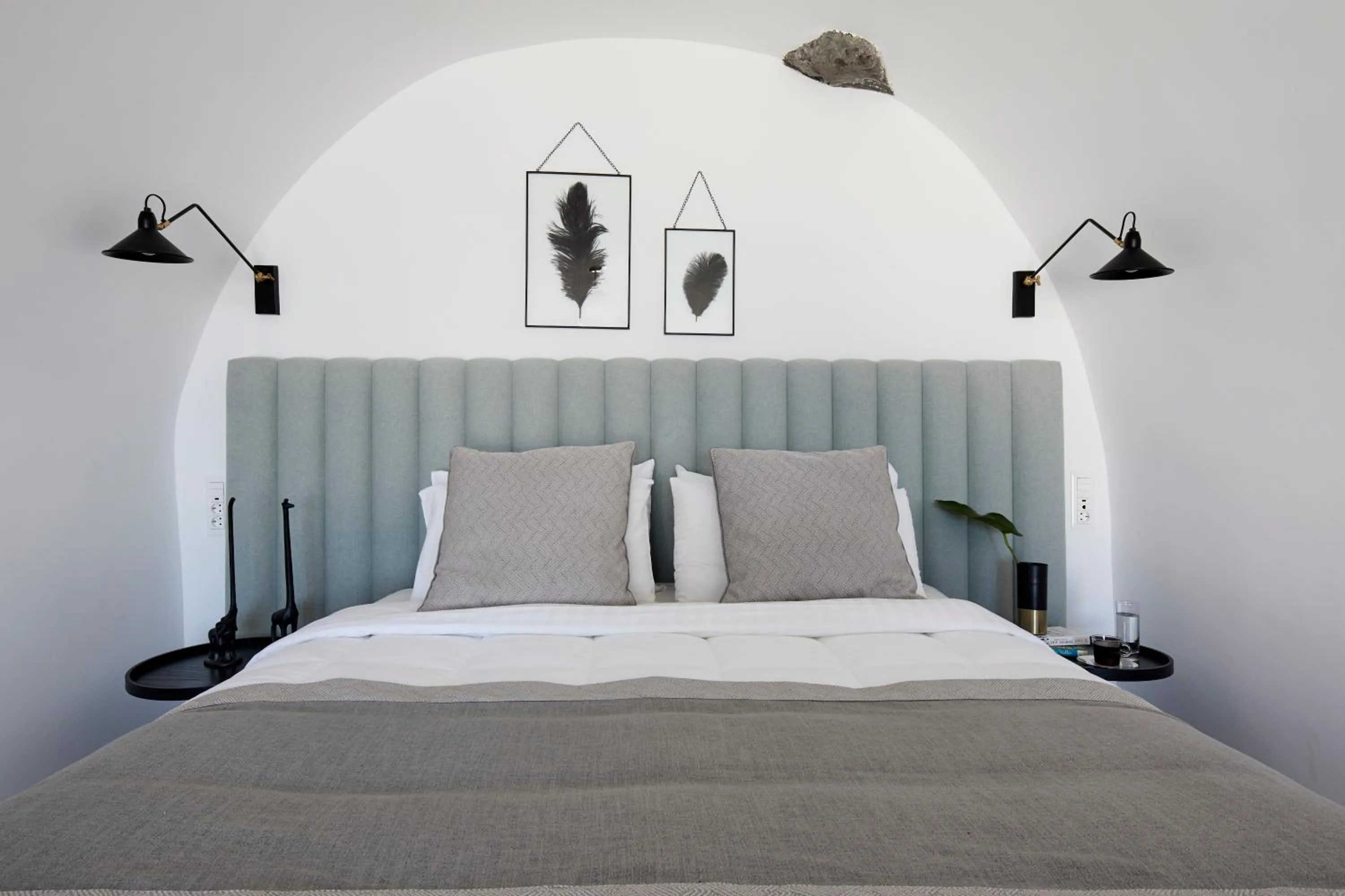 Bed in Petit Palace Suites