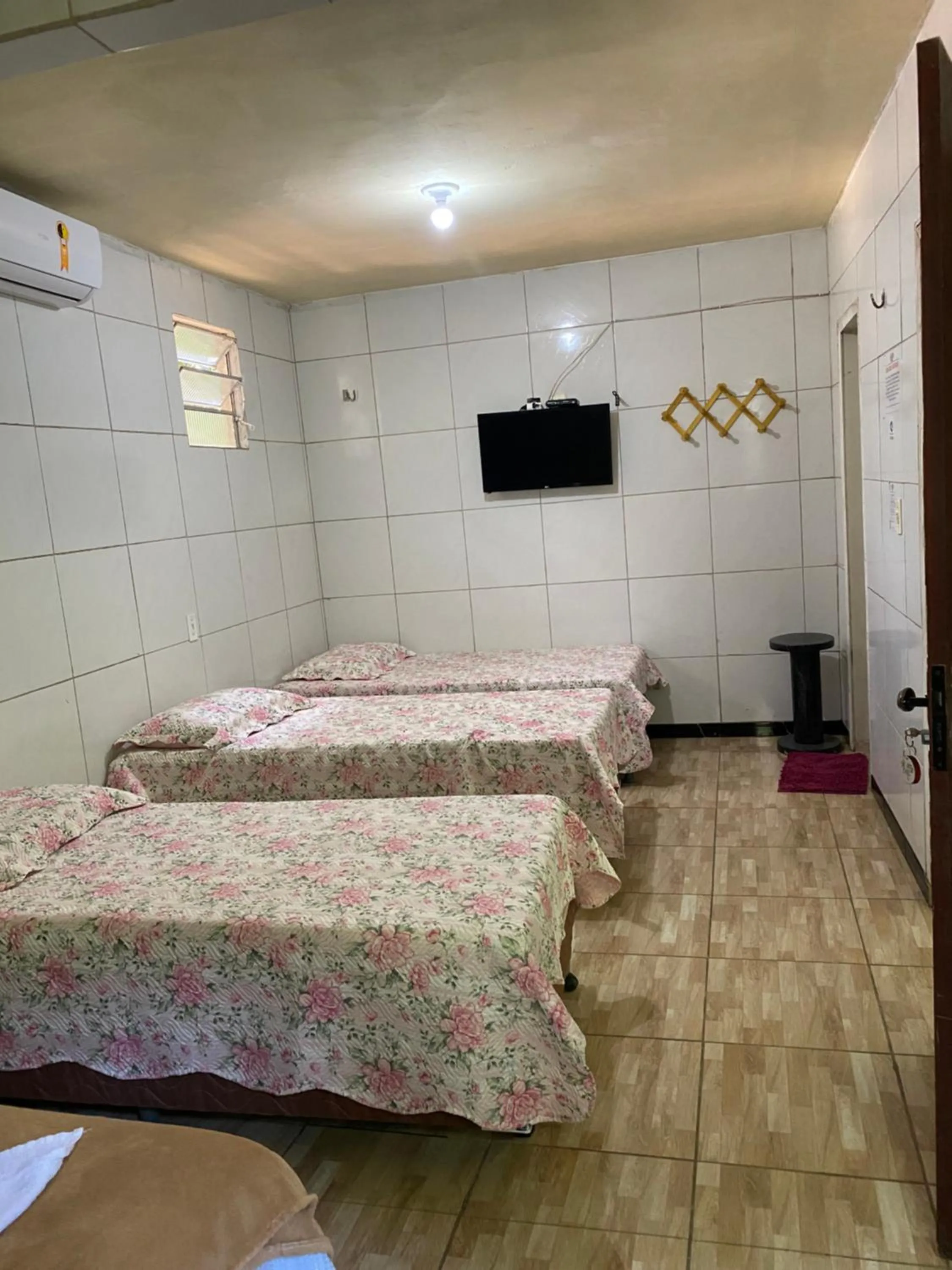 Bed in Pousada Preocupacao Zero