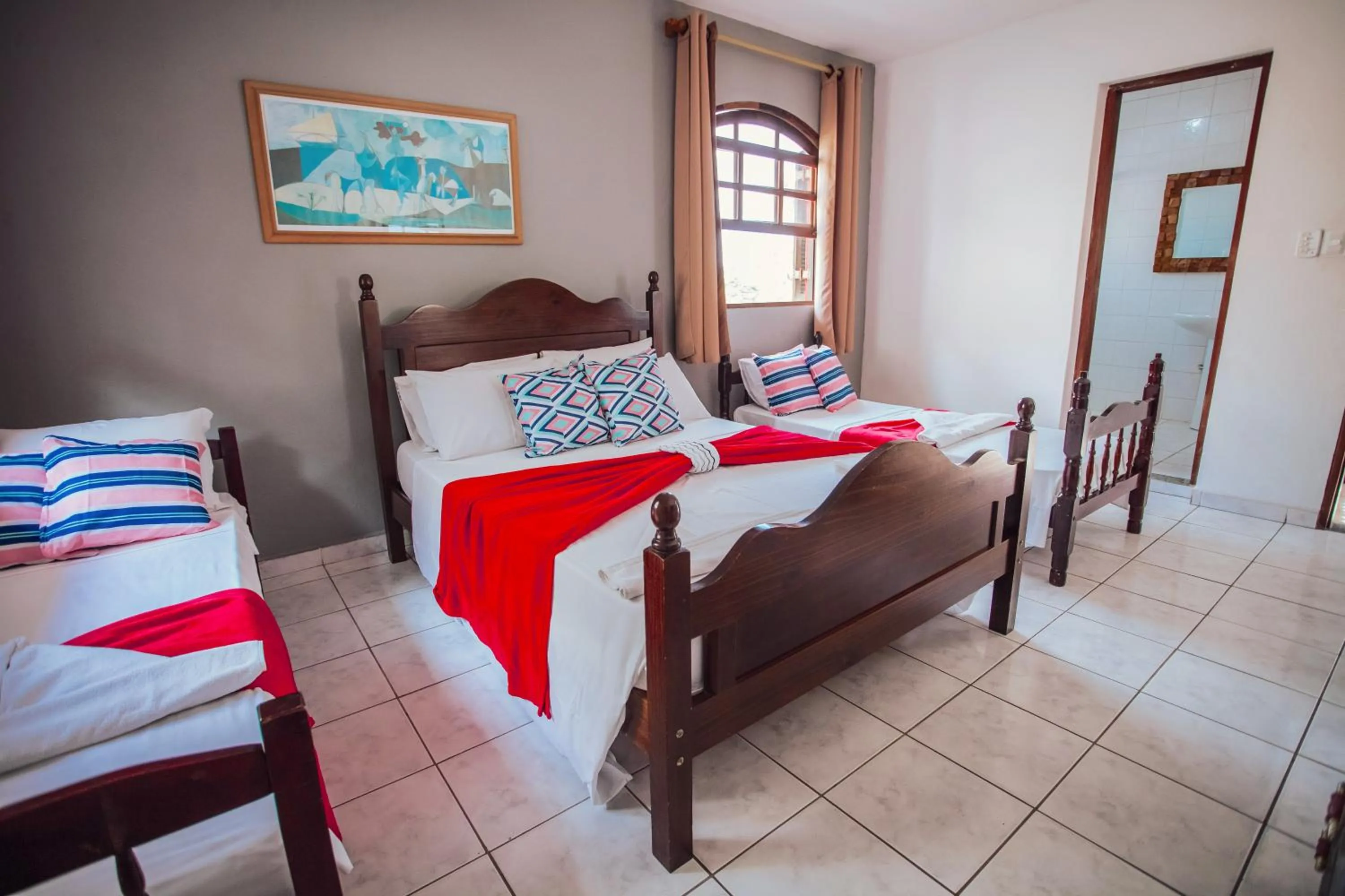 Bed in Pousada Chale Suísso