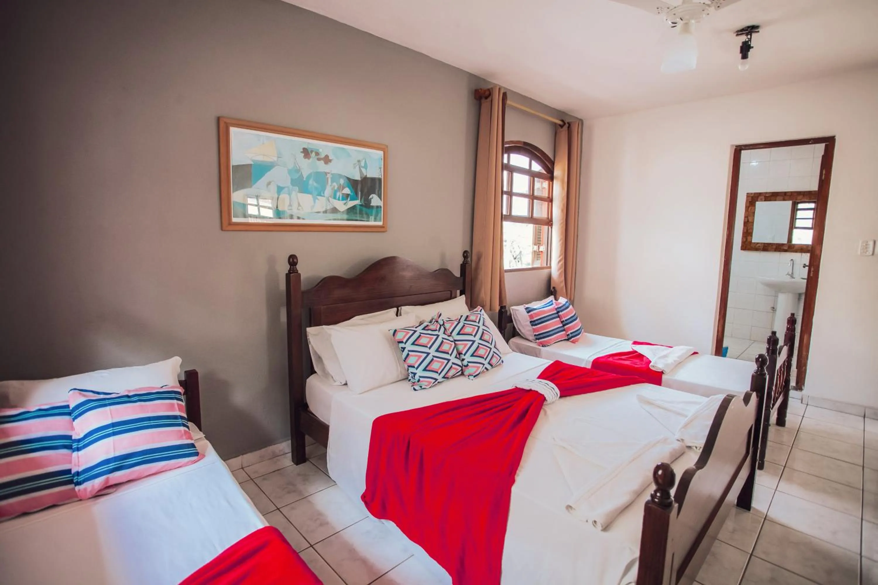 Bed in Pousada Chale Suísso