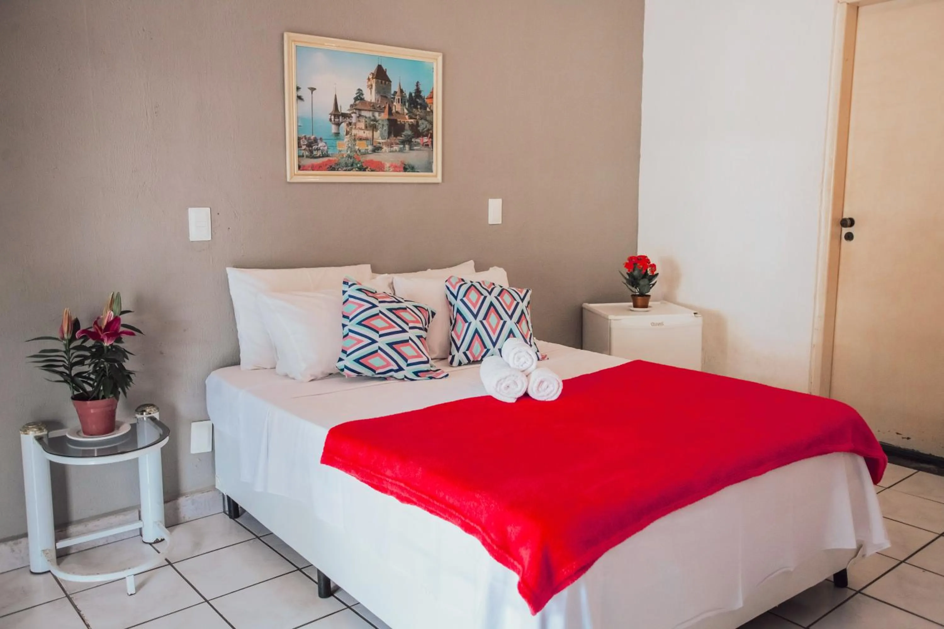 Bed in Pousada Chale Suísso