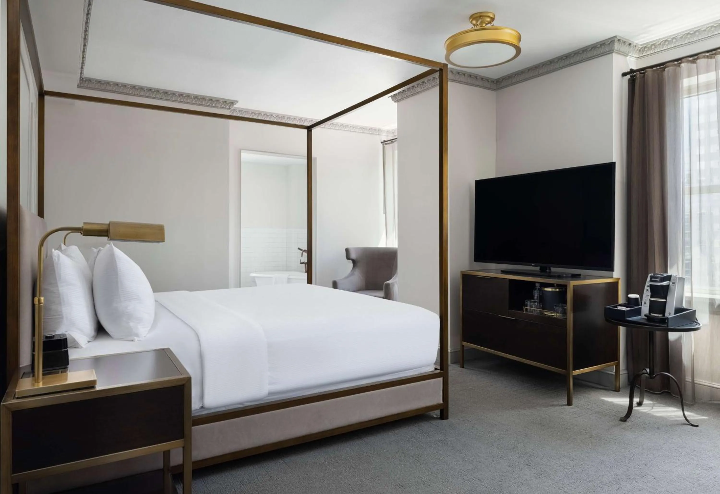 Bed in Hotel Phillips Kansas City, Curio Collection By Hilton