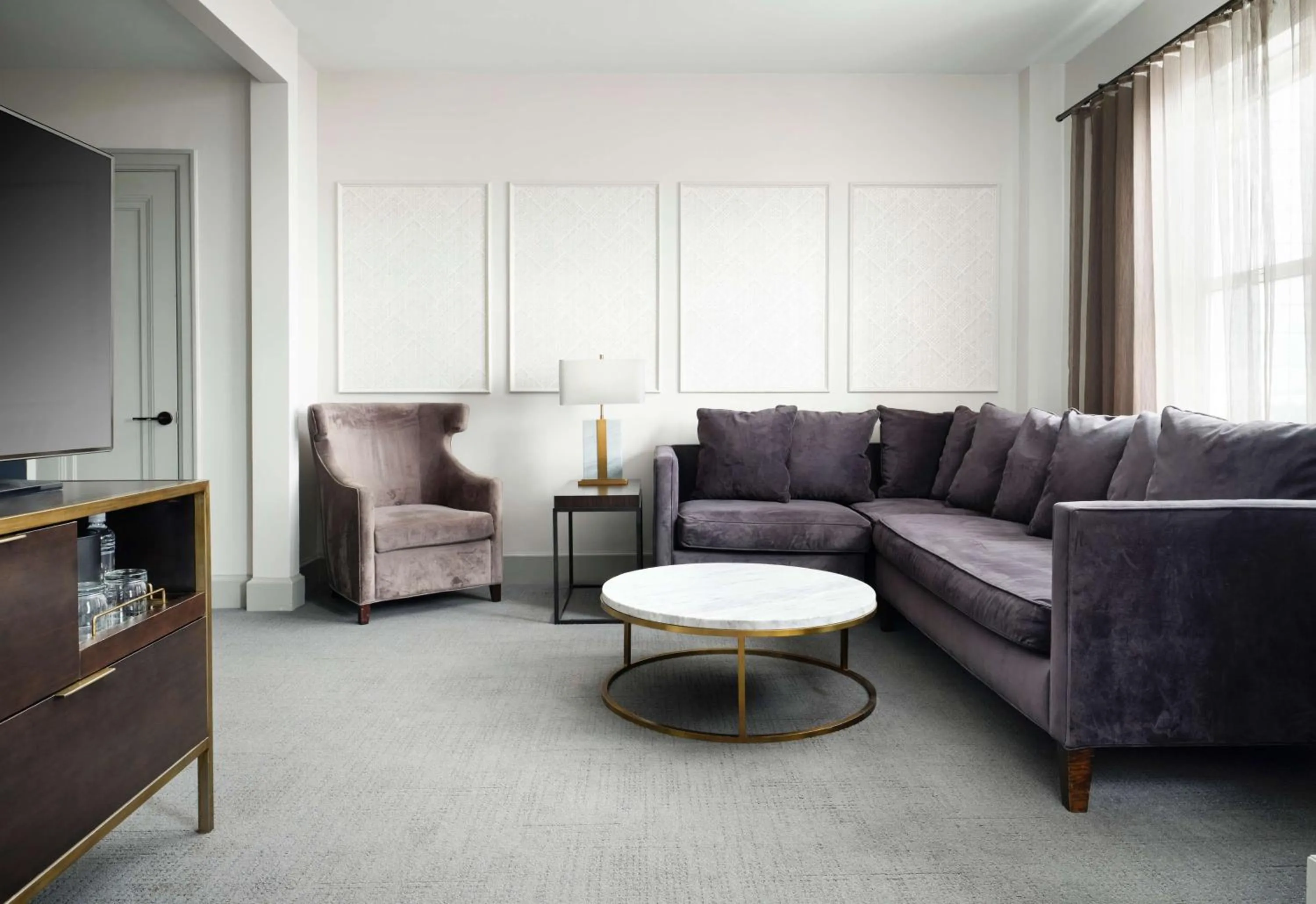 Living room in Hotel Phillips Kansas City, Curio Collection By Hilton
