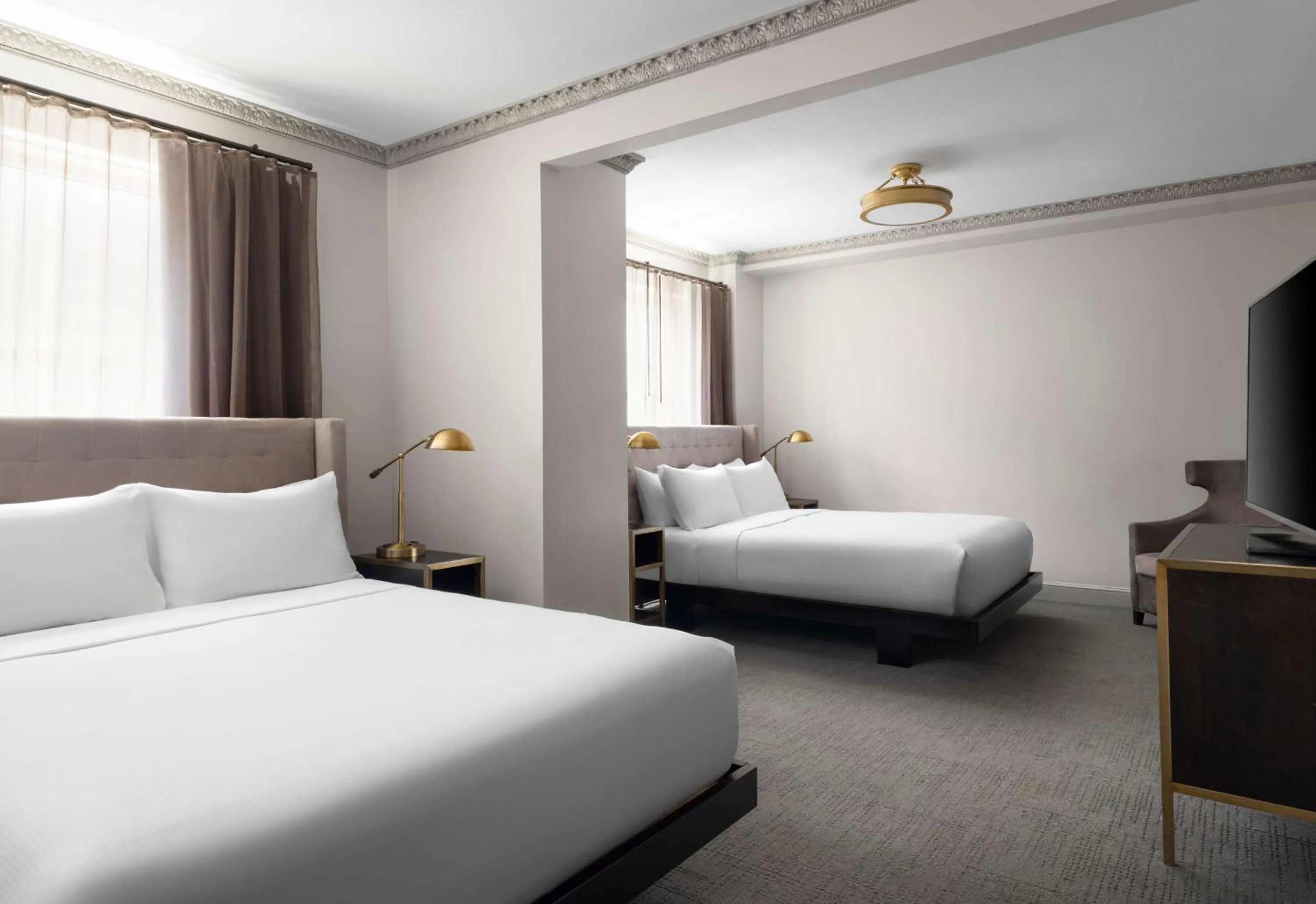 Bed in Hotel Phillips Kansas City, Curio Collection By Hilton