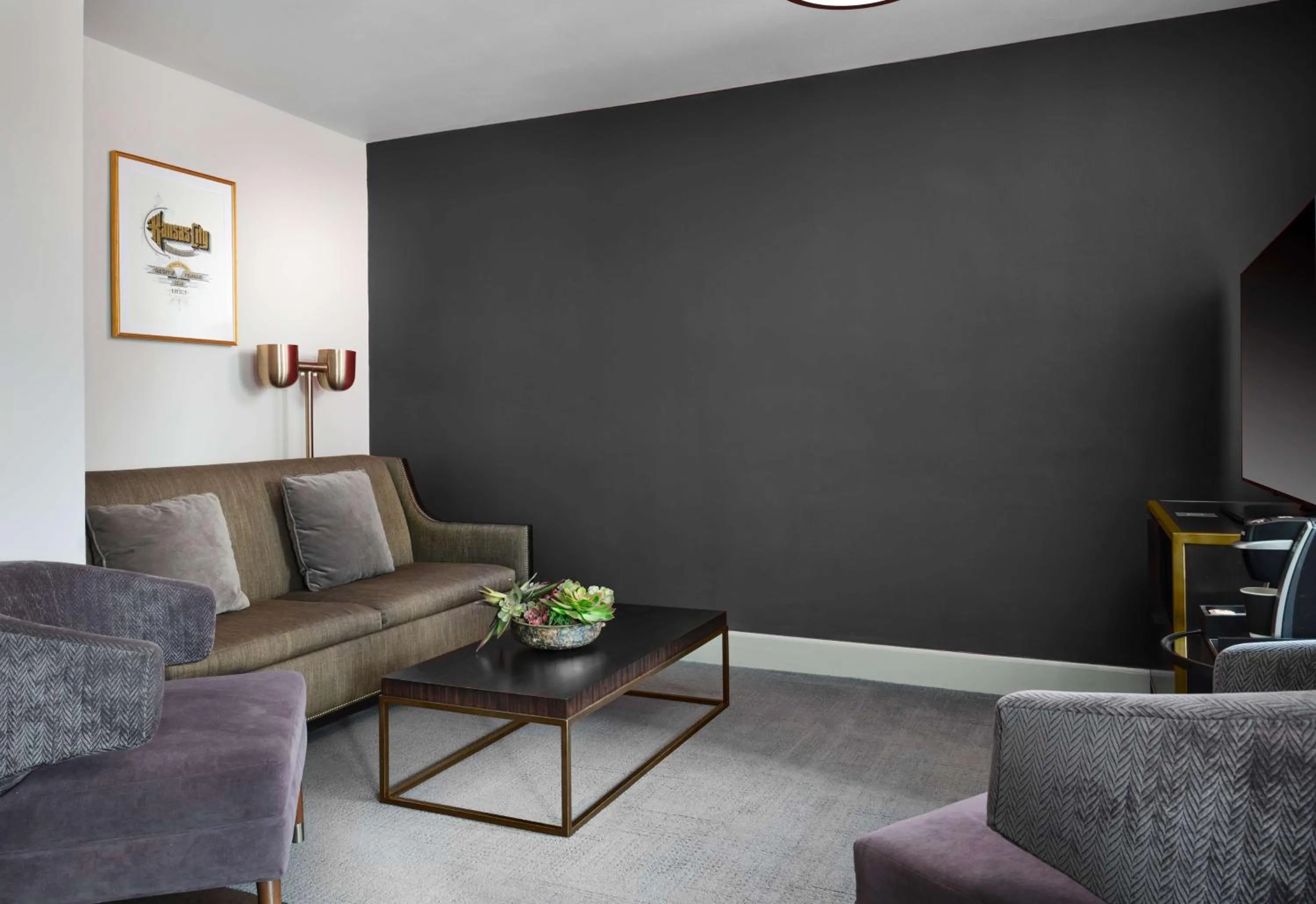 Living room in Hotel Phillips Kansas City, Curio Collection By Hilton