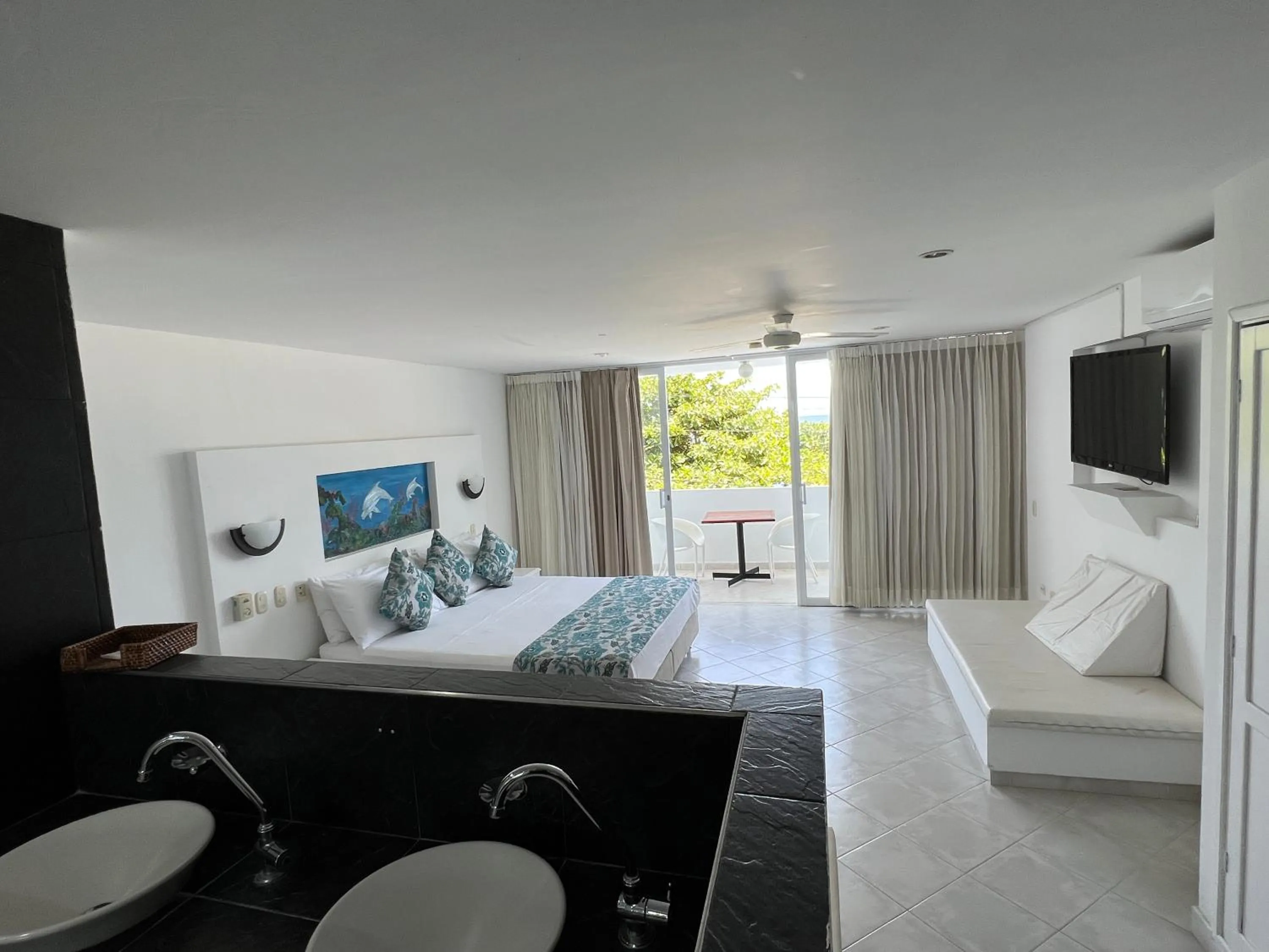 Bed in La Ballena Azul Hotel