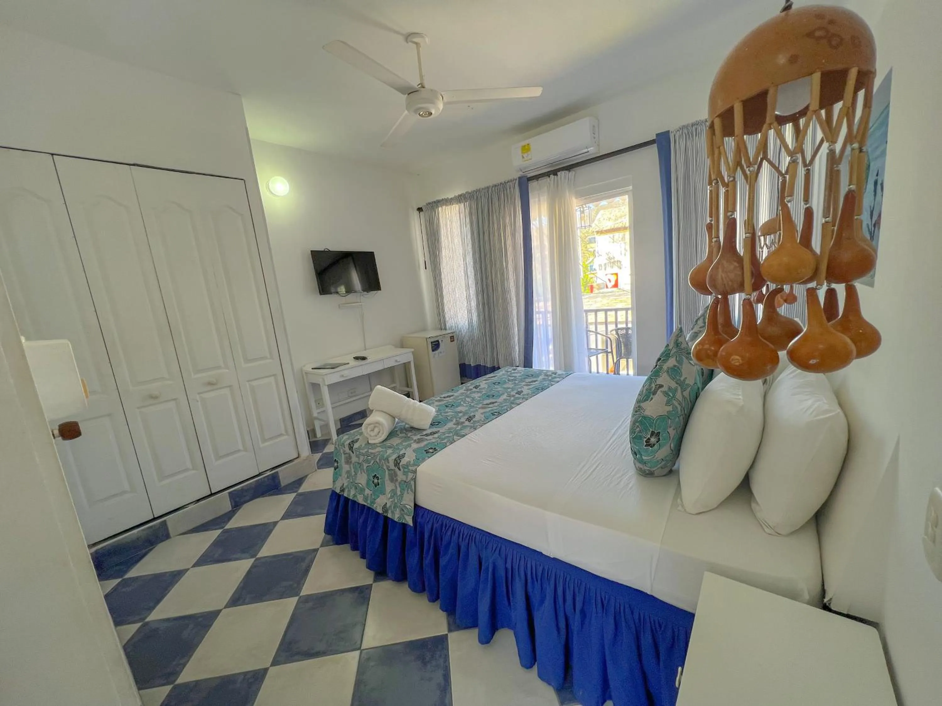 Bed in La Ballena Azul Hotel