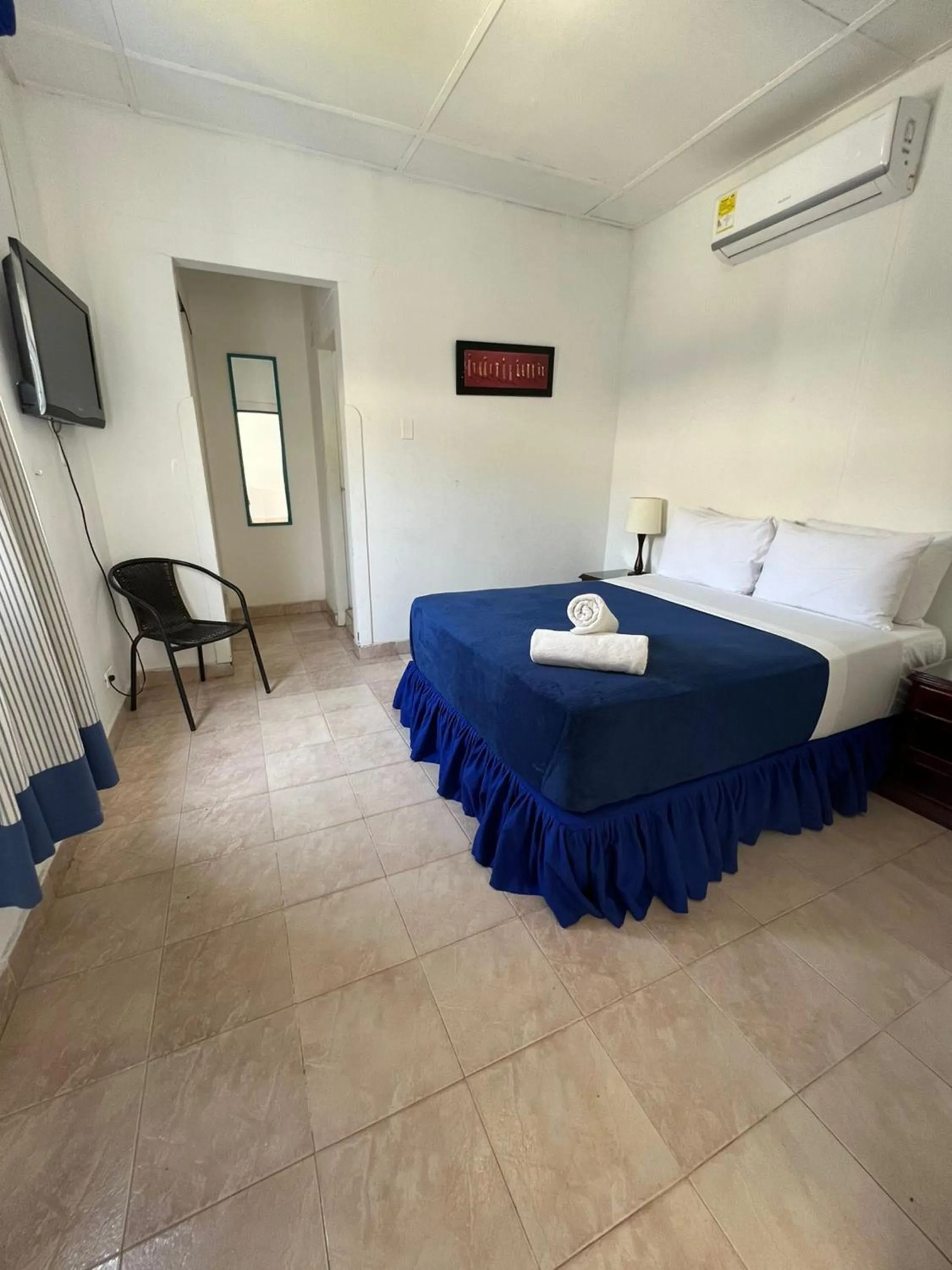 Bed in La Ballena Azul Hotel