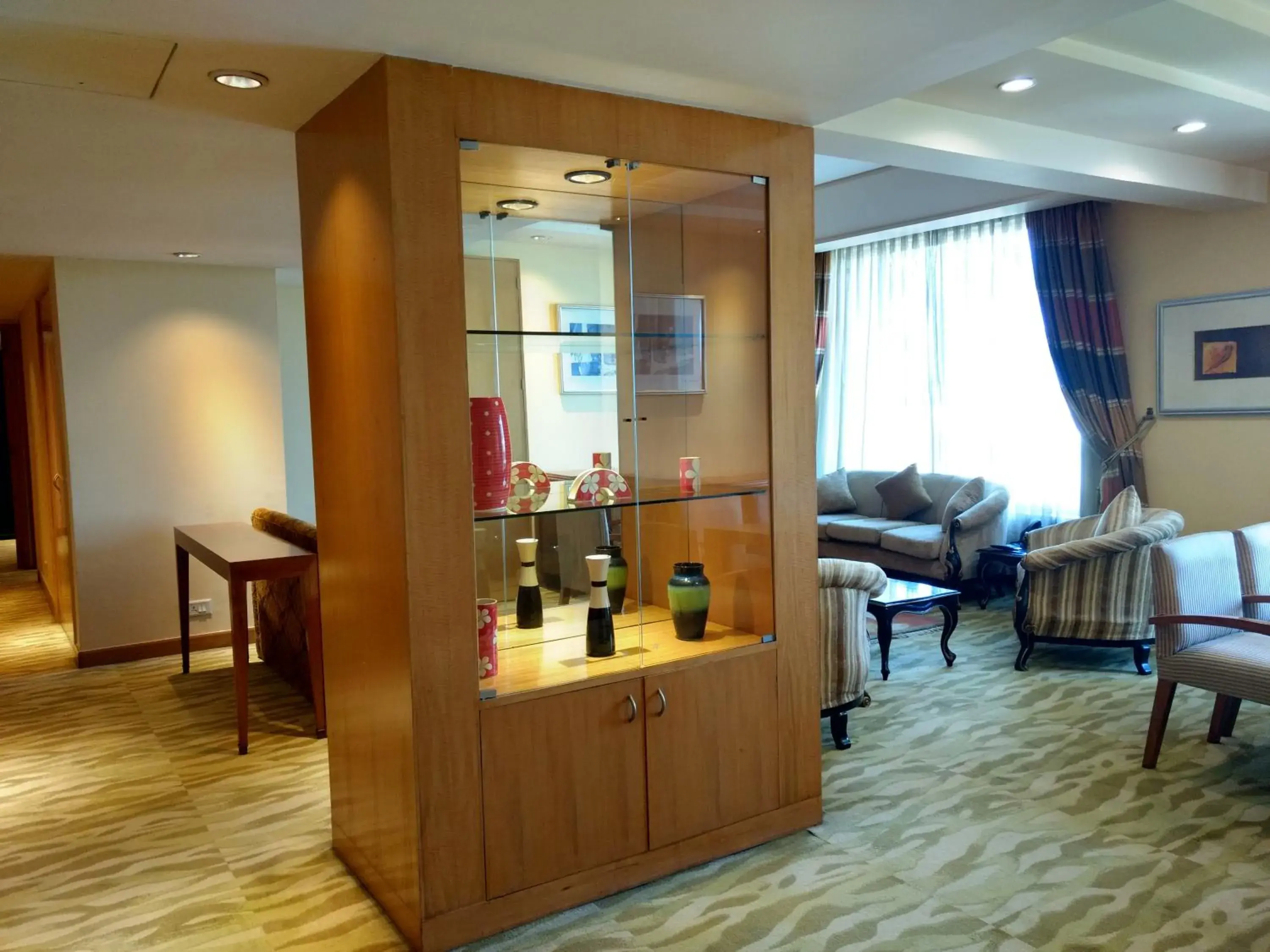 Living room in The Grand New Delhi Living room in The Grand New Delhi