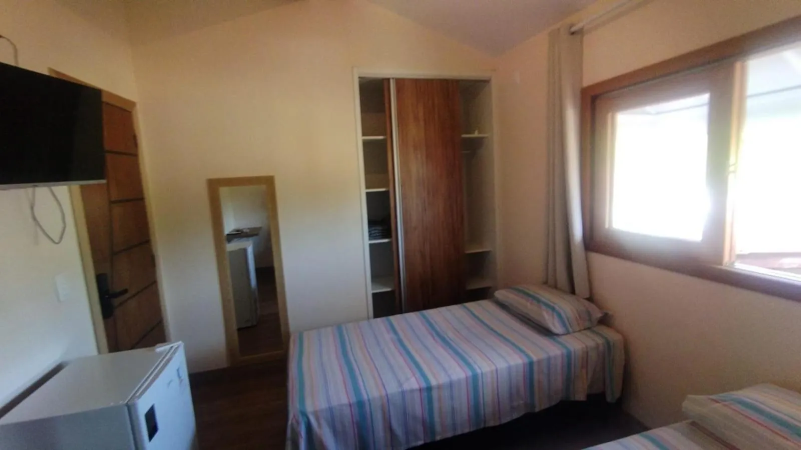 Photo of the whole room, Bed in Pousada Primavera