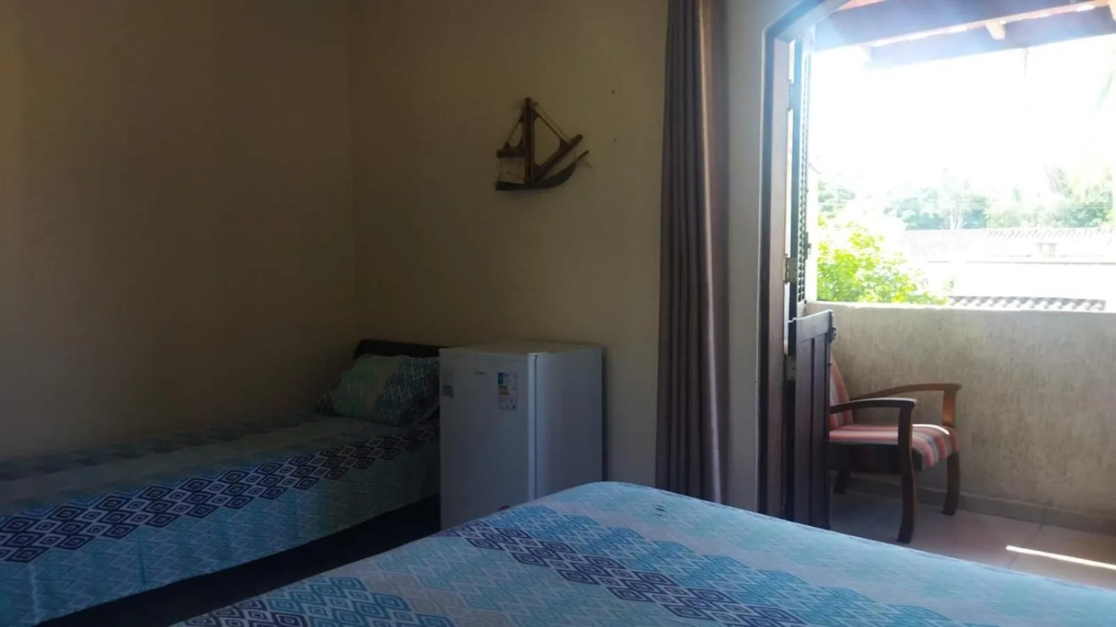 Balcony/Terrace, Bed in Pousada Primavera