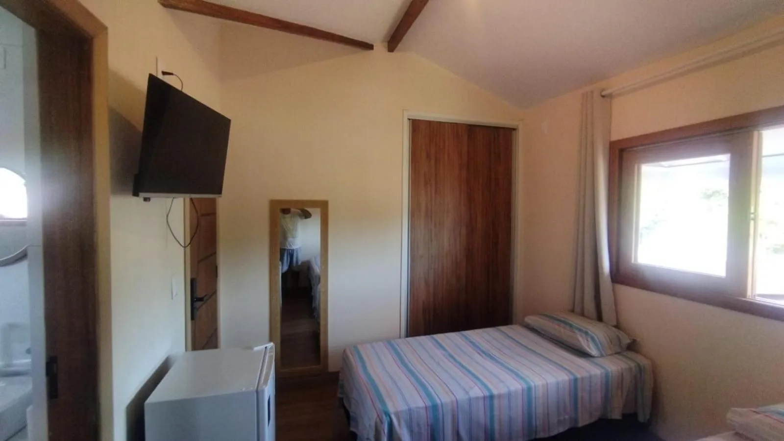 TV and multimedia, Bed in Pousada Primavera