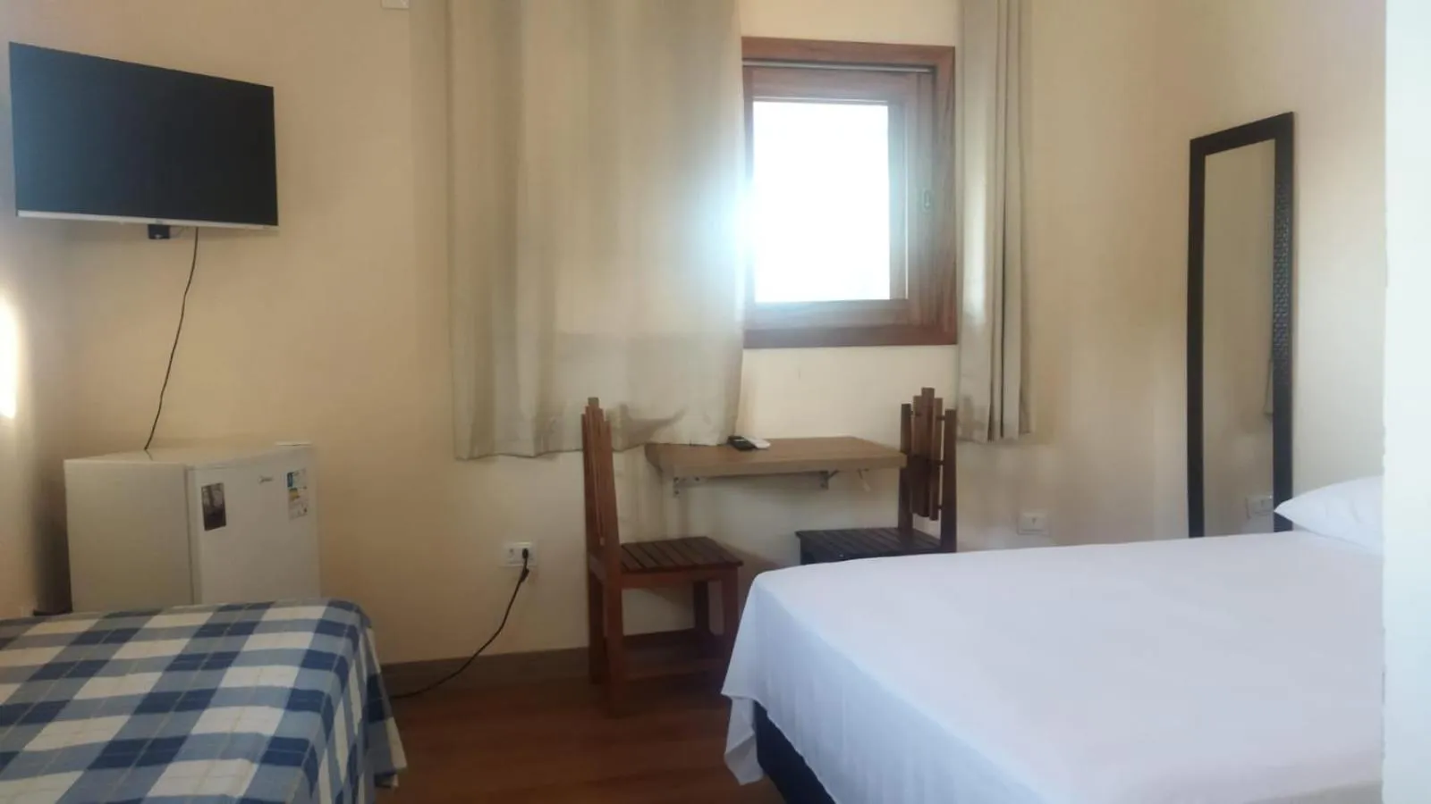 Bed in Pousada Primavera