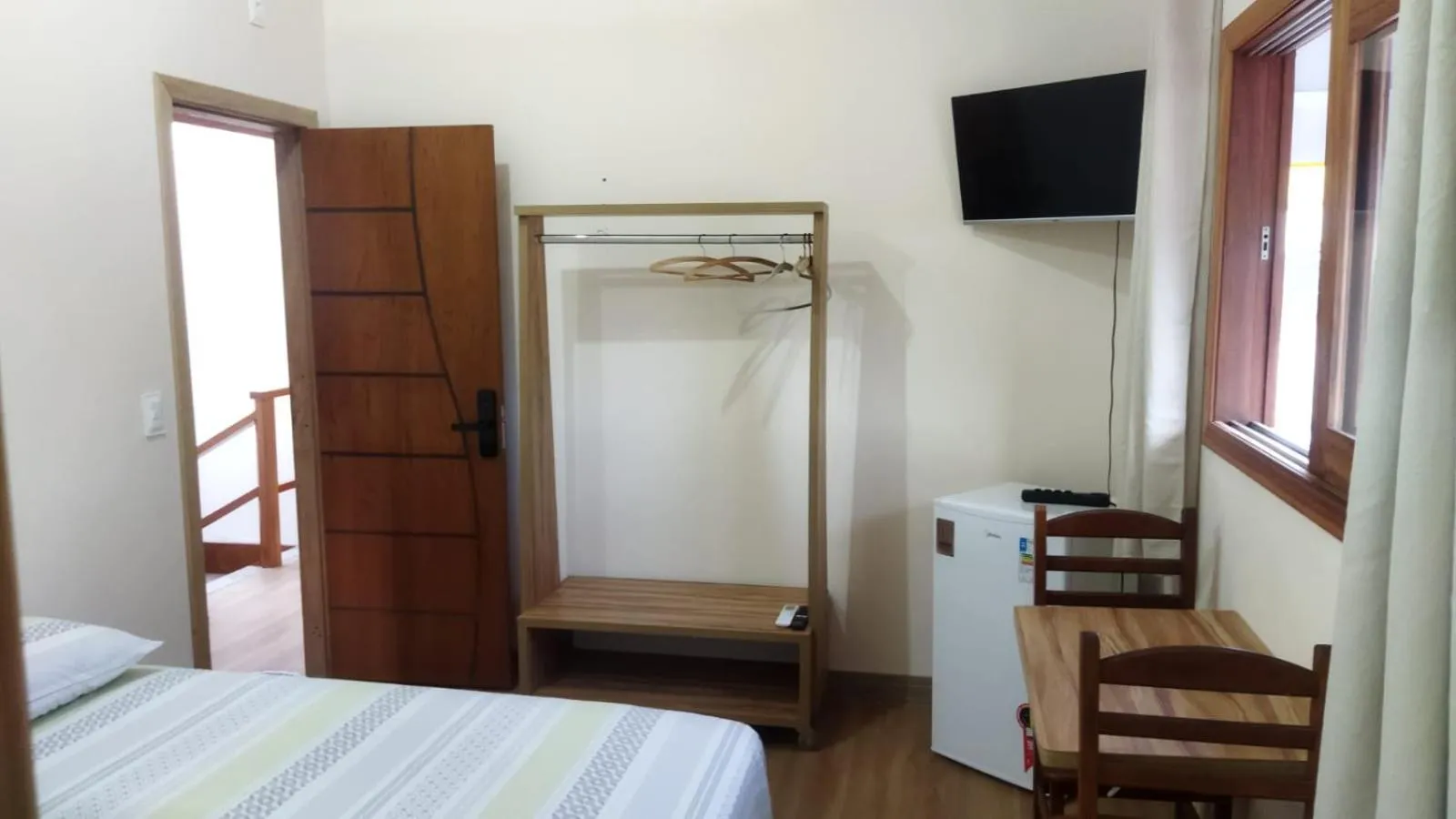 Photo of the whole room, Bed in Pousada Primavera