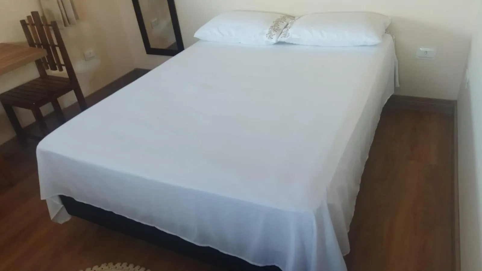 Bed in Pousada Primavera