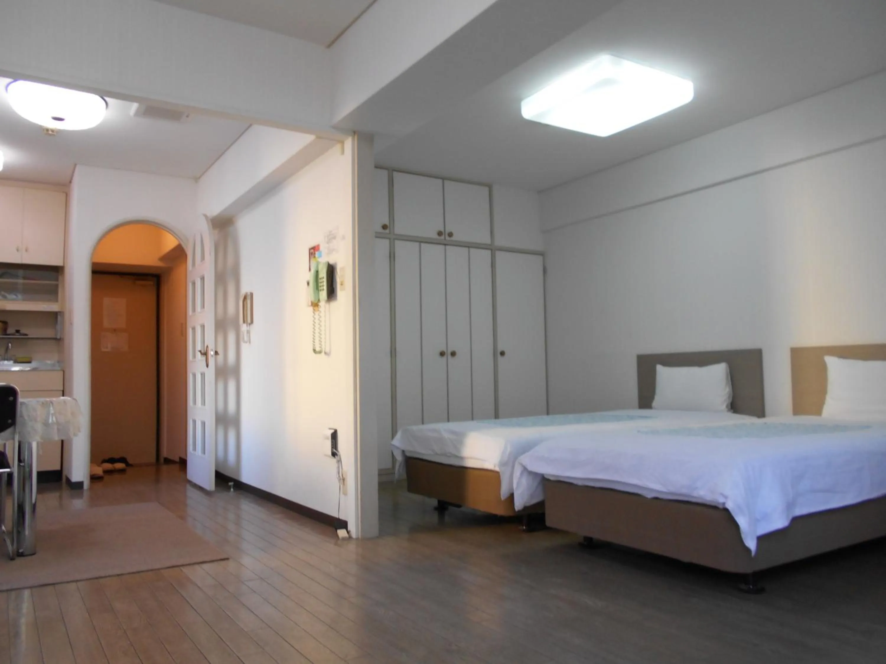 Photo of the whole room, Bed in Weekly Green In Namba