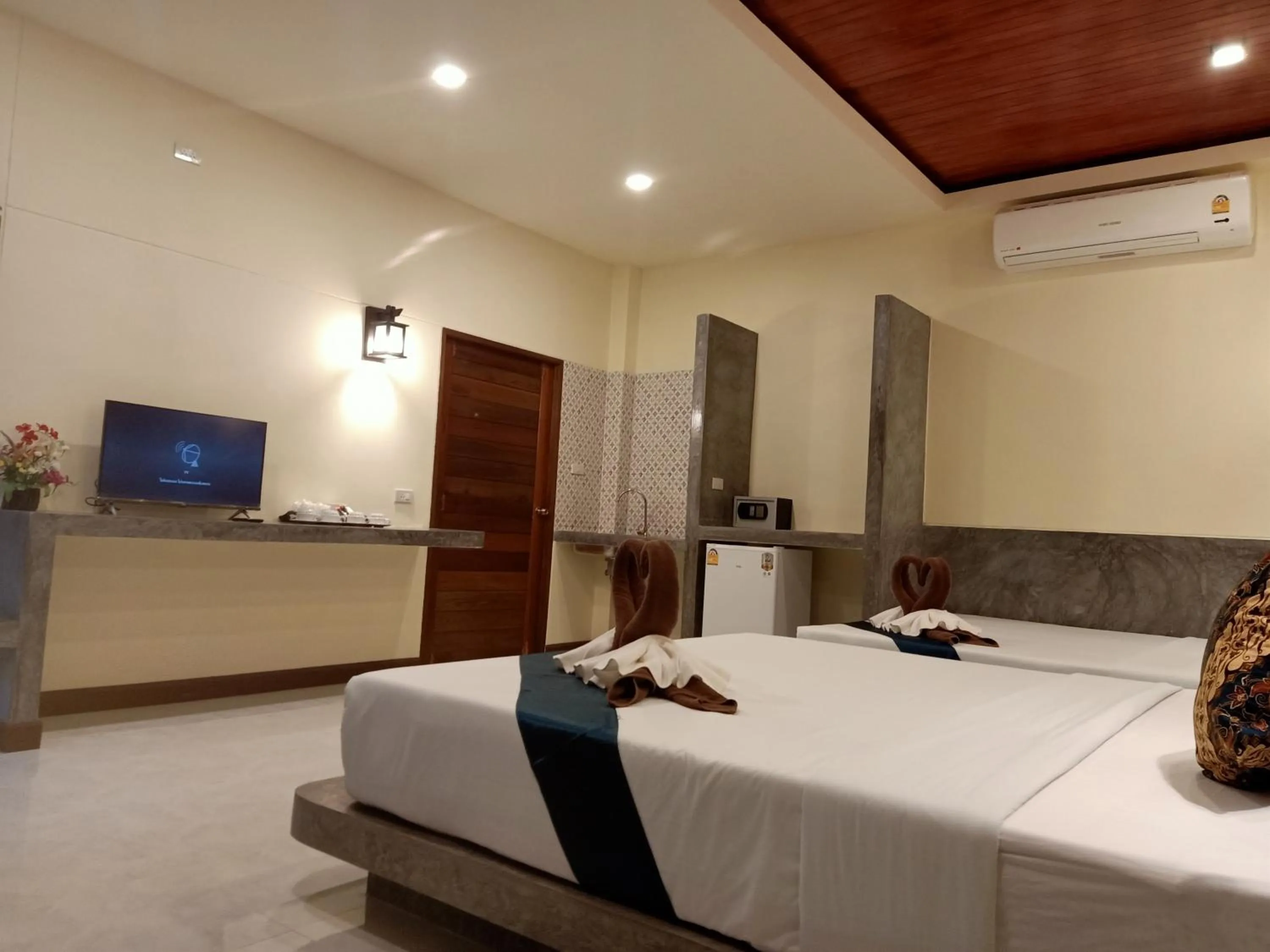 Bed in Lanta Pearl Beach Resort