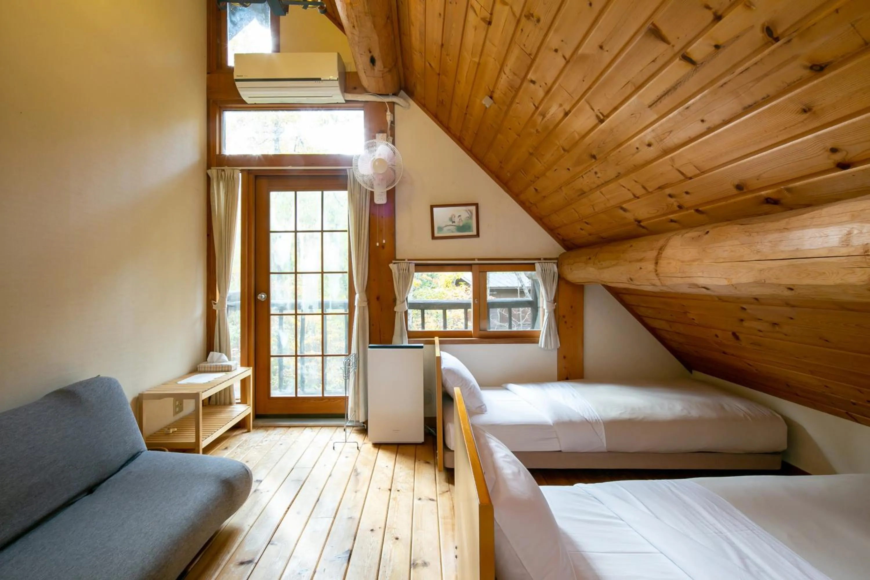 Bed in Canadian Loghouse Inn AzuminoYujin