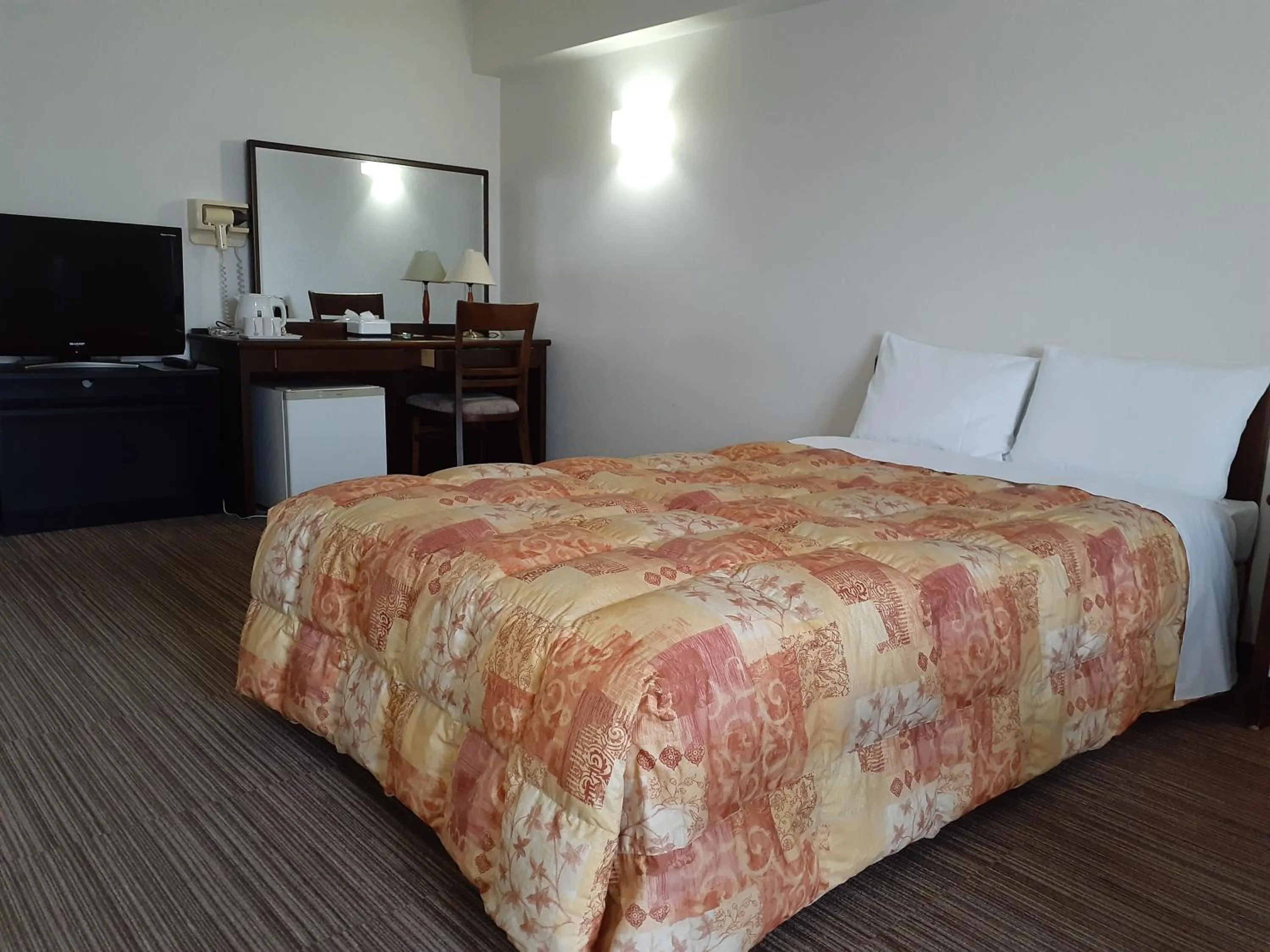 Bed in Hotel New Plaza Kurume