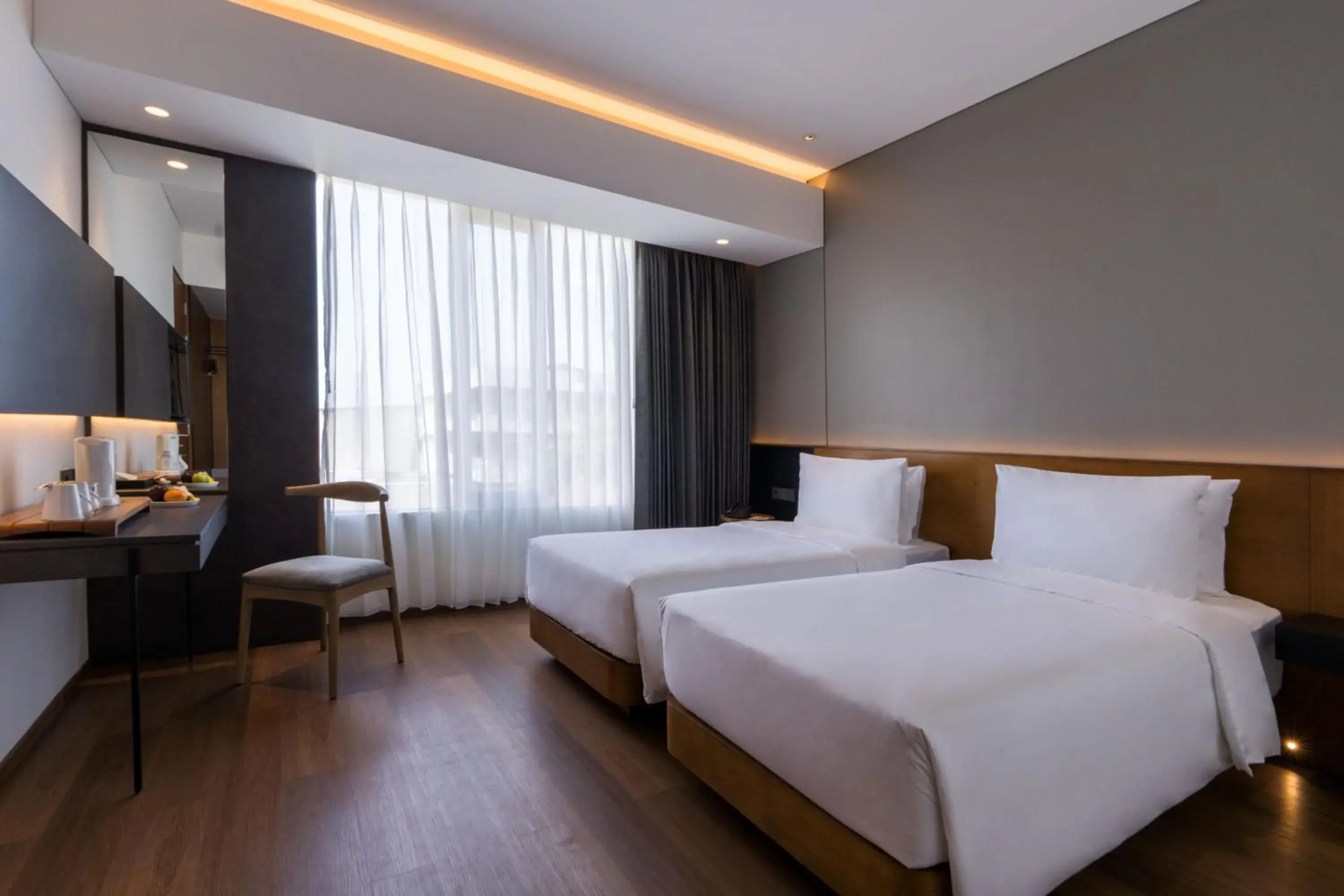 Superior Twin Room in Hotel Santika Bangka Superior Twin Room in Hotel Santika Bangka