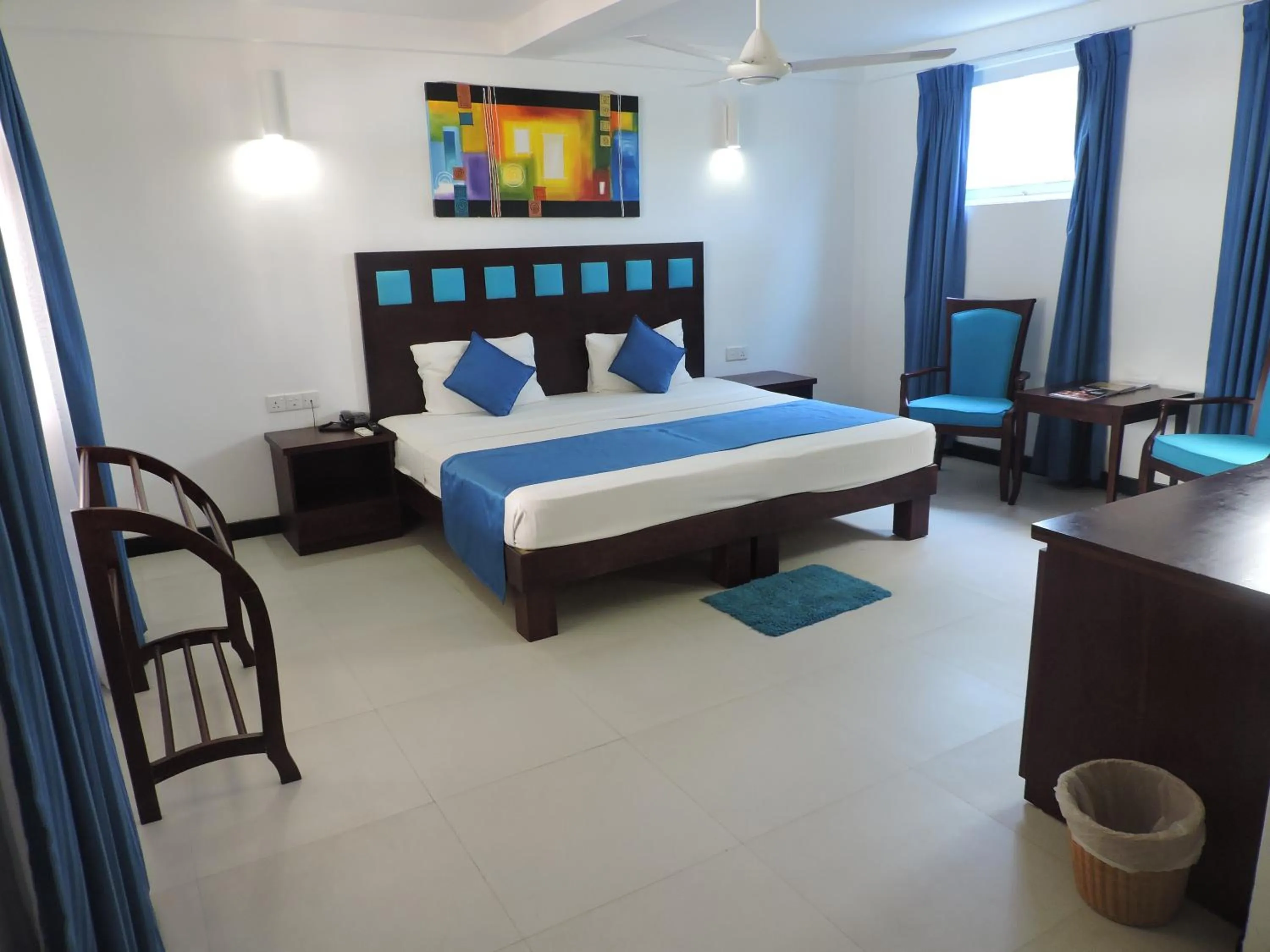 Photo of the whole room, Bed in Pigeon Island Beach Resort