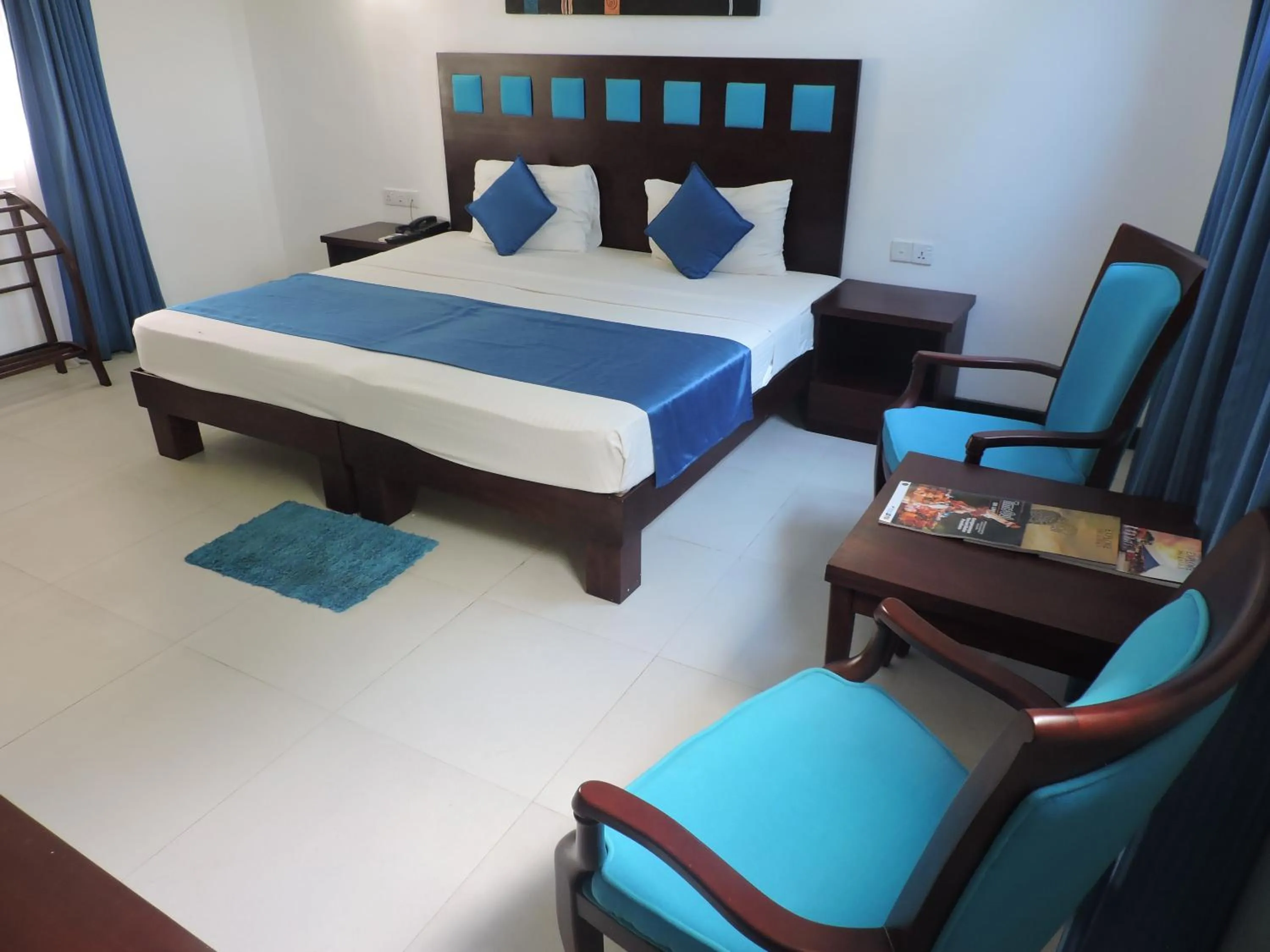 Photo of the whole room, Bed in Pigeon Island Beach Resort