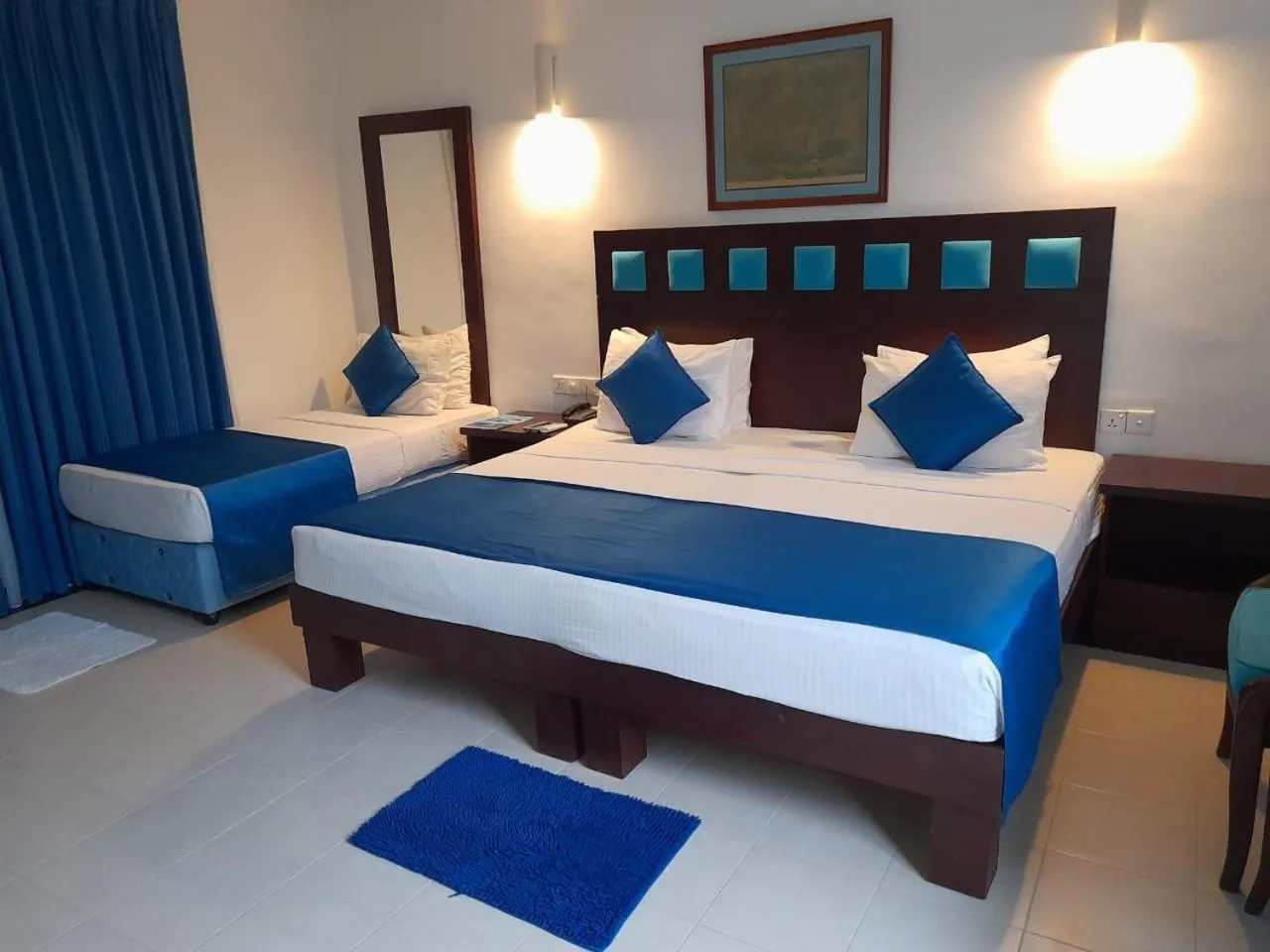 Photo of the whole room, Bed in Pigeon Island Beach Resort
