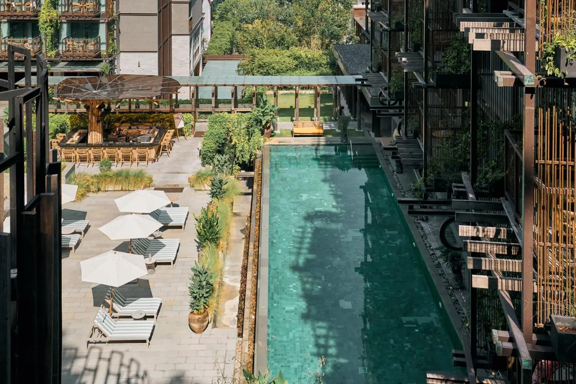 Swimming pool in Dinso Resort & Villas Phuket, Vignette Collection by IHG Swimming pool in Dinso Resort & Villas Phuket, Vignette Collection by IHG