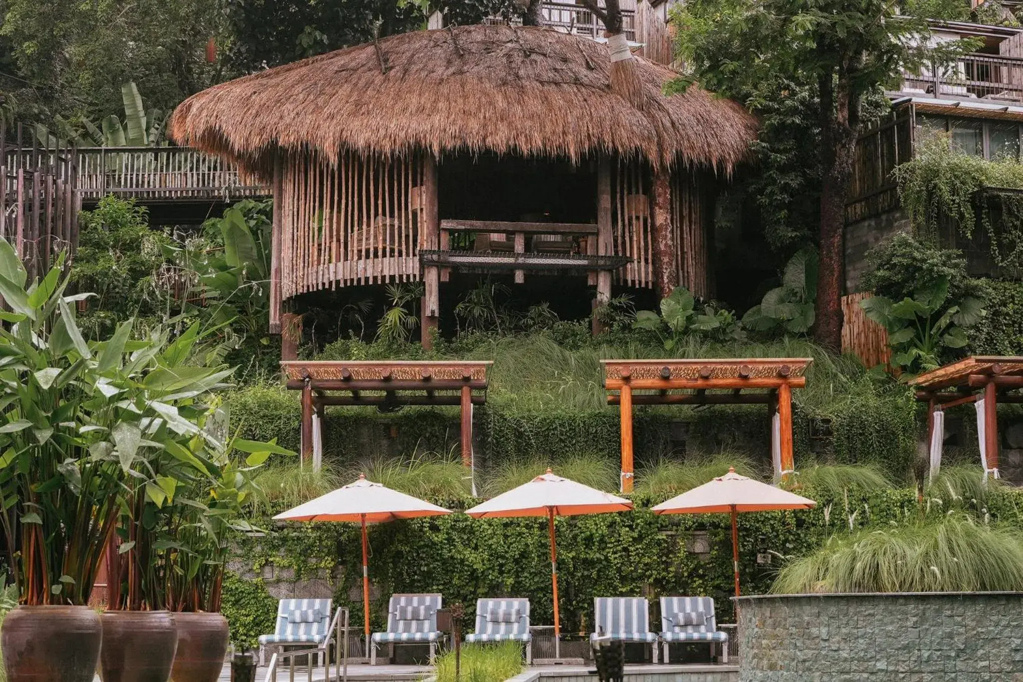 Lounge or bar in Dinso Resort & Villas Phuket, Vignette Collection by IHG Lounge or bar in Dinso Resort & Villas Phuket, Vignette Collection by IHG