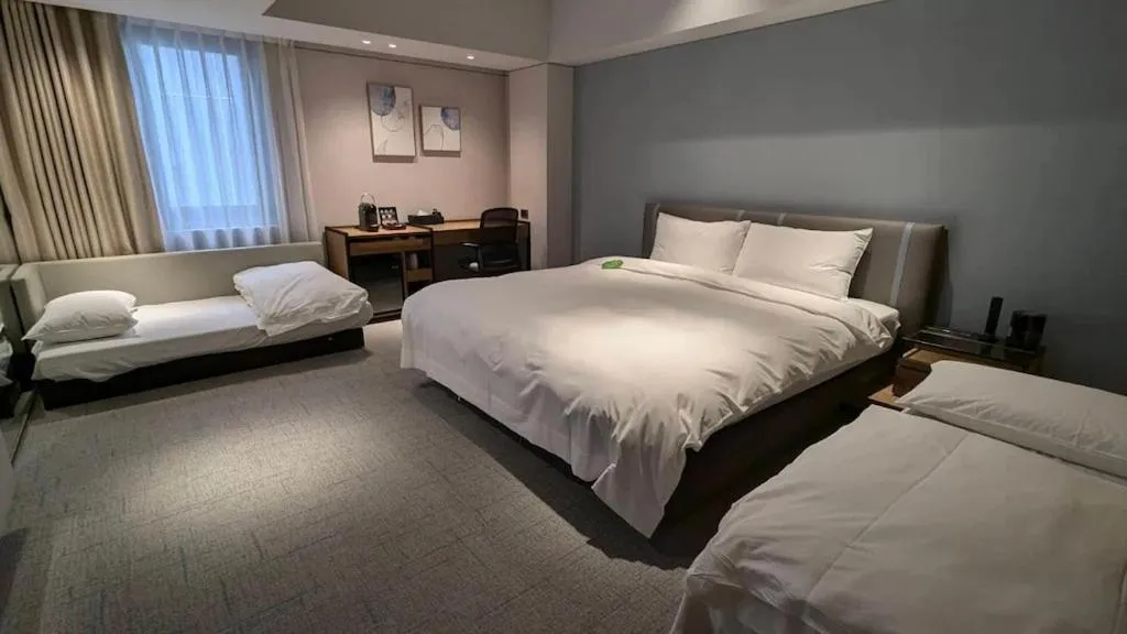 Photo of the whole room, Bed in K Hotel Taipei Nanjing