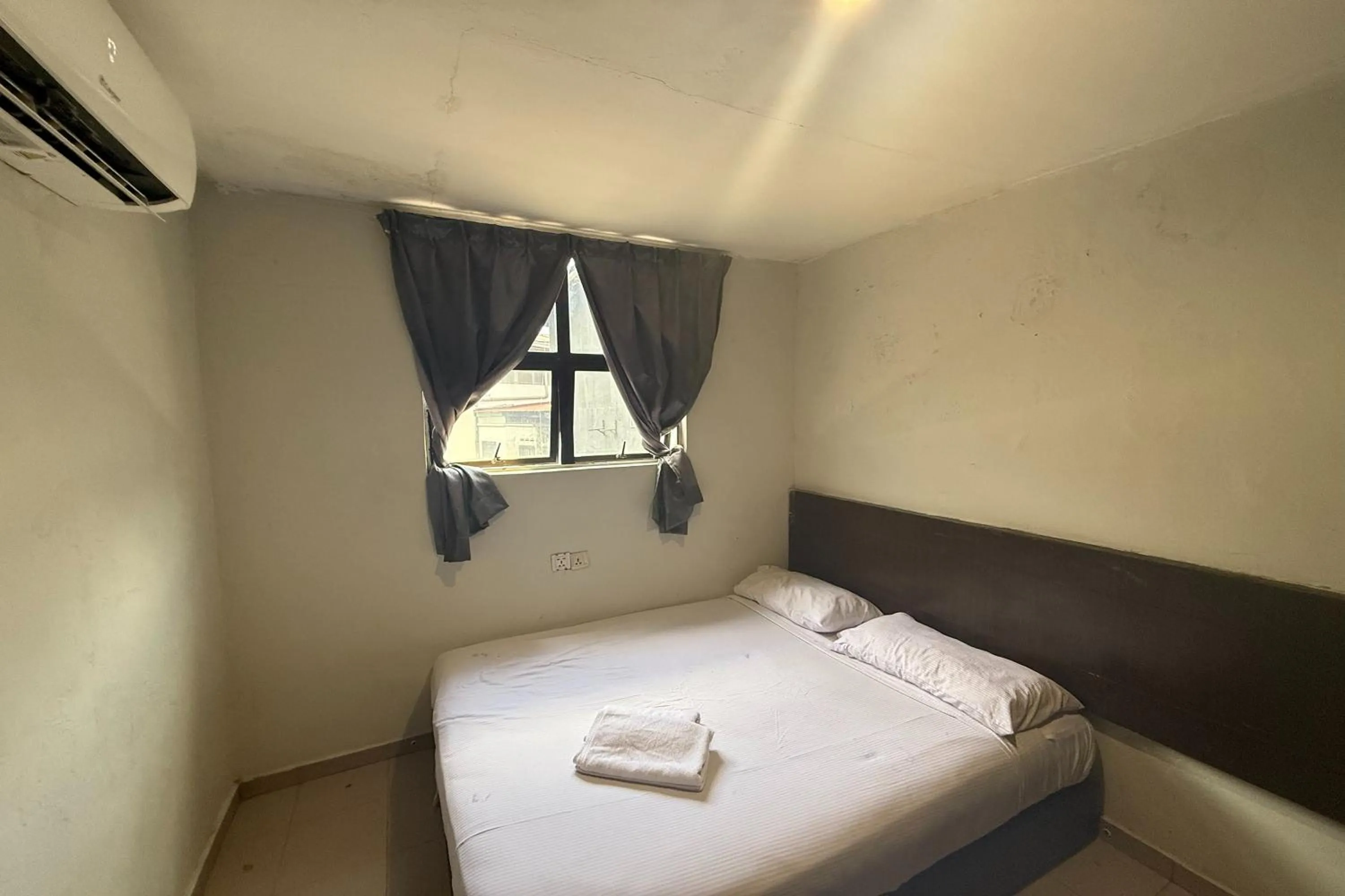 Bed in Tiong Nam Hotel