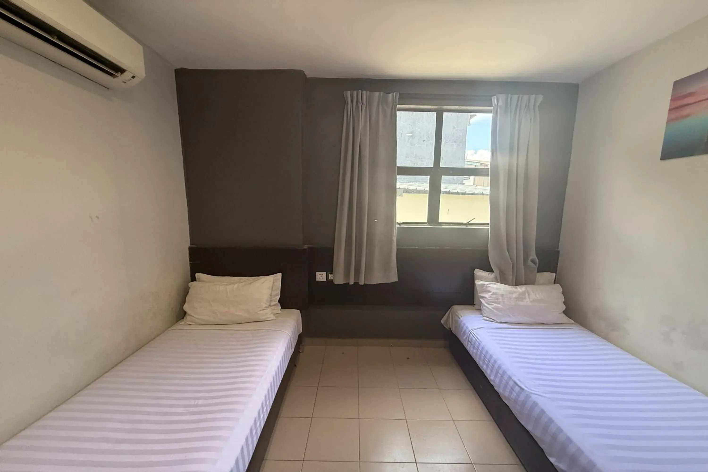 Bed in Tiong Nam Hotel Bed in Tiong Nam Hotel