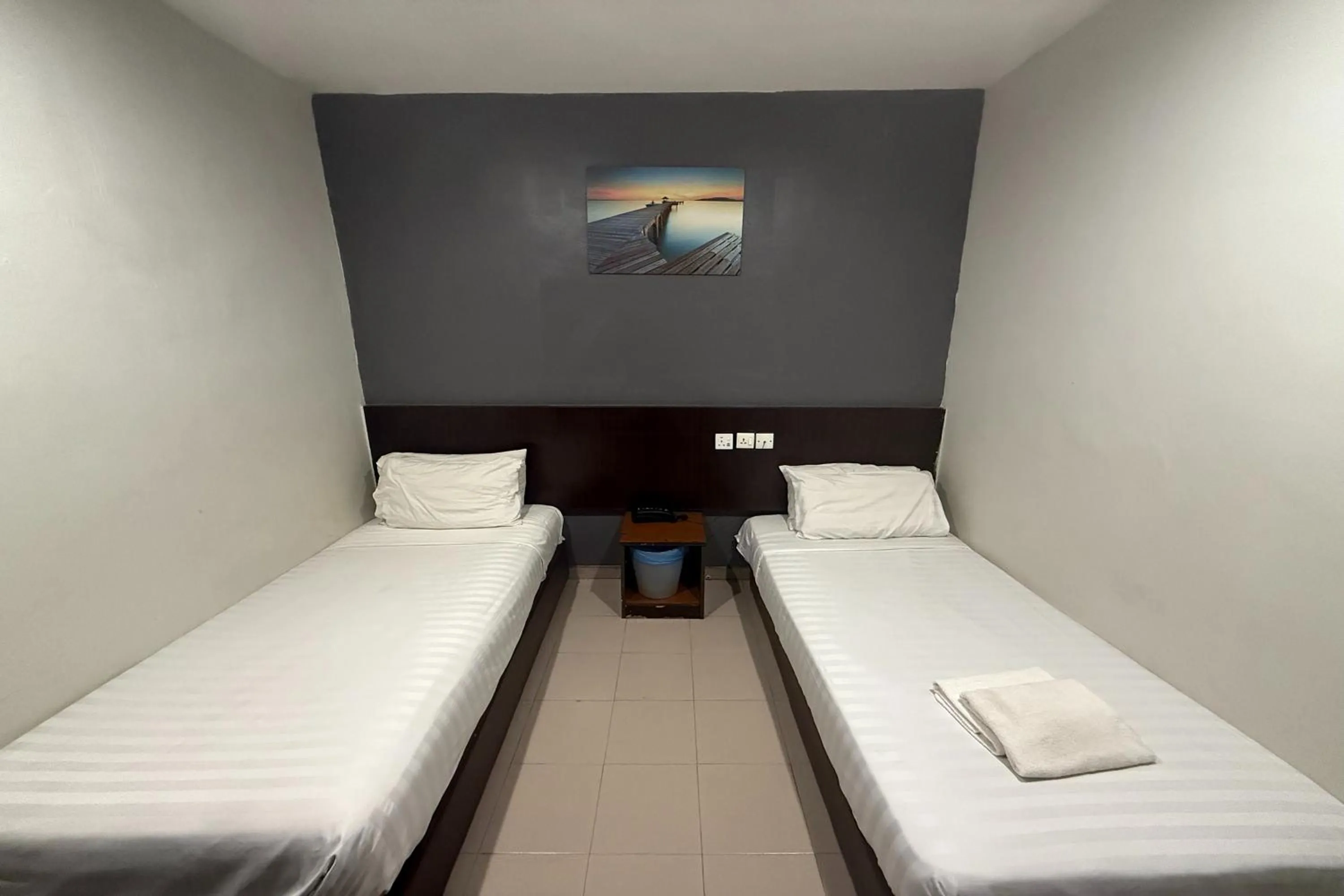 Bed in Tiong Nam Hotel