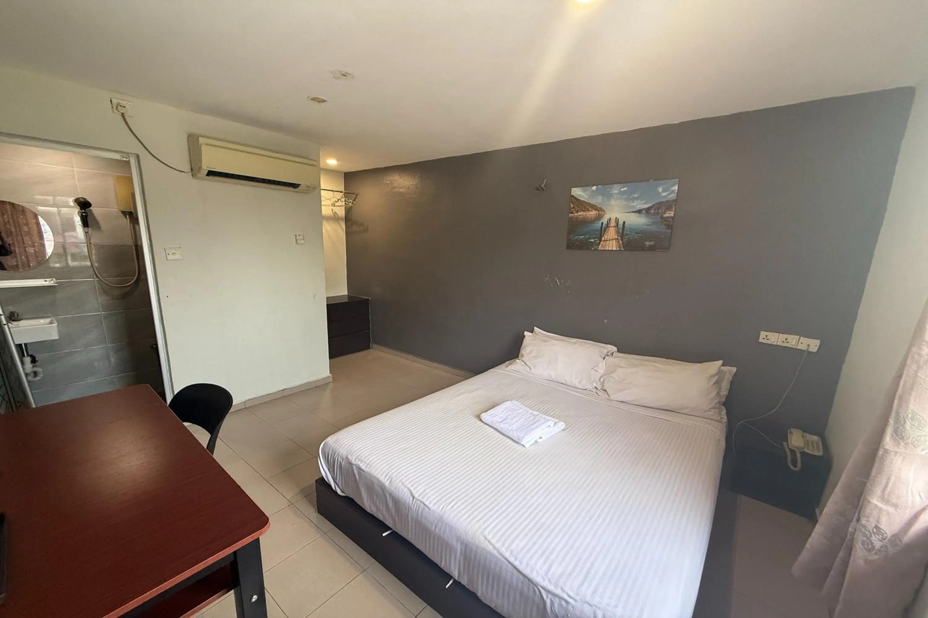 Bed in Tiong Nam Hotel