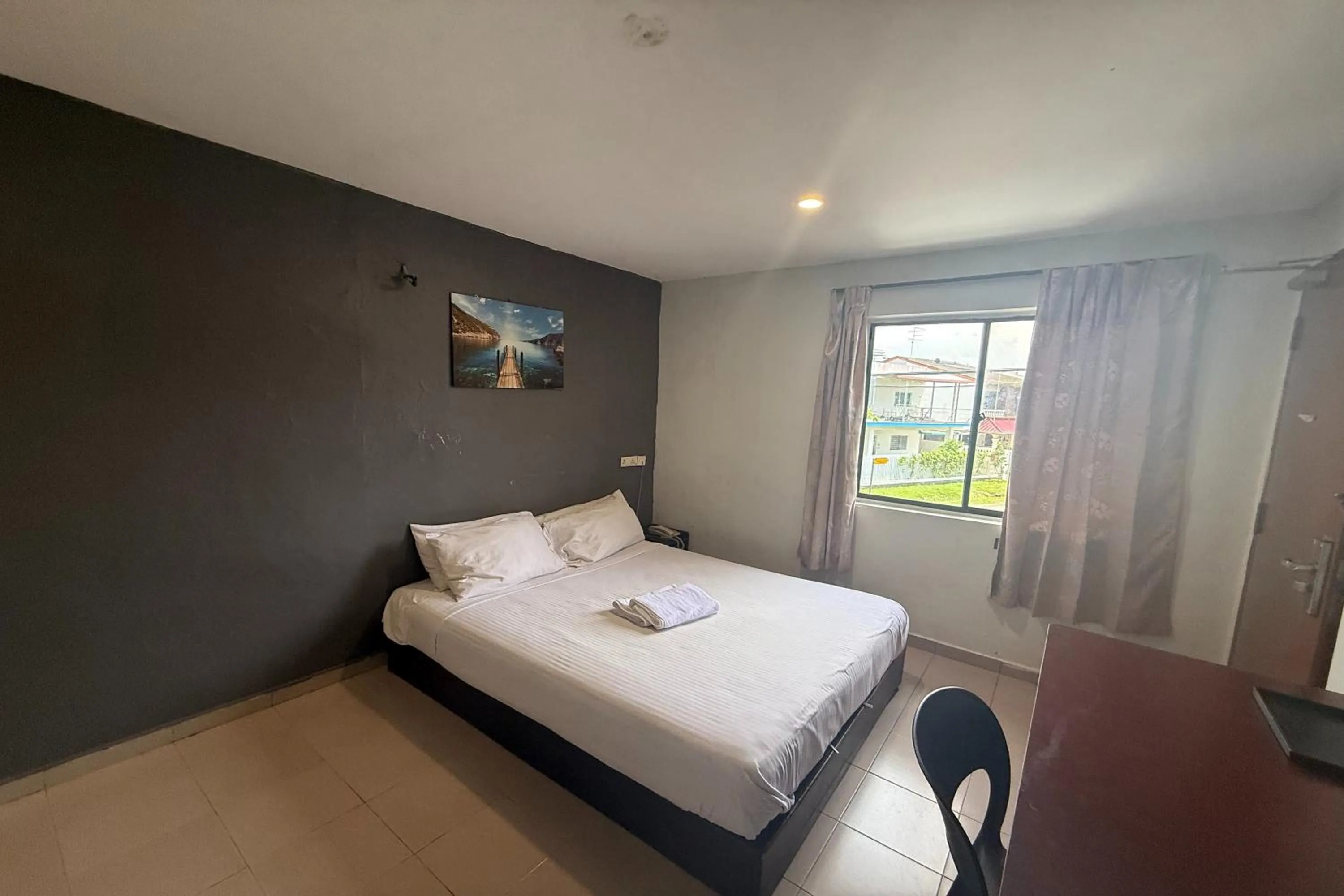 Bed in Tiong Nam Hotel