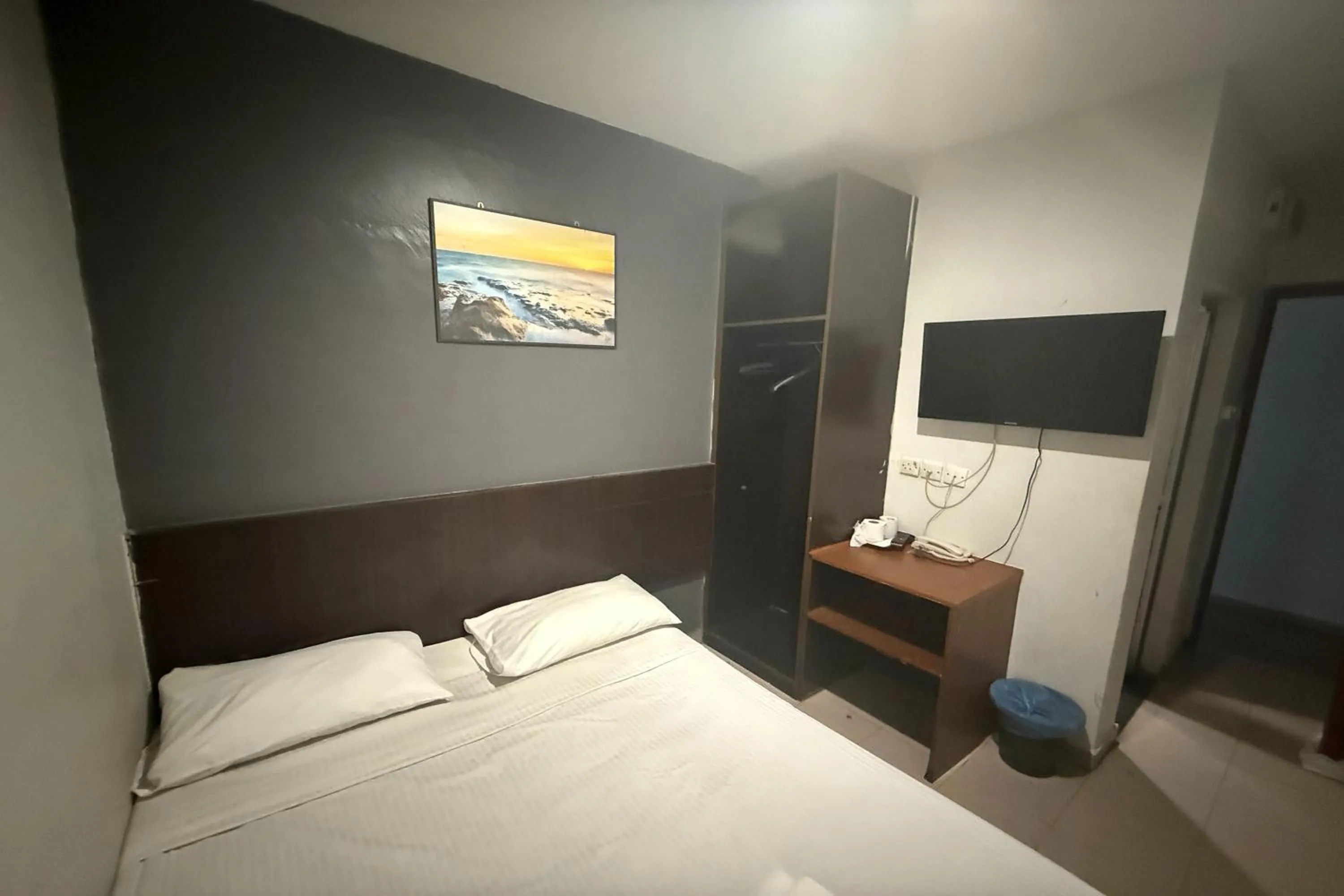 Bed in Tiong Nam Hotel