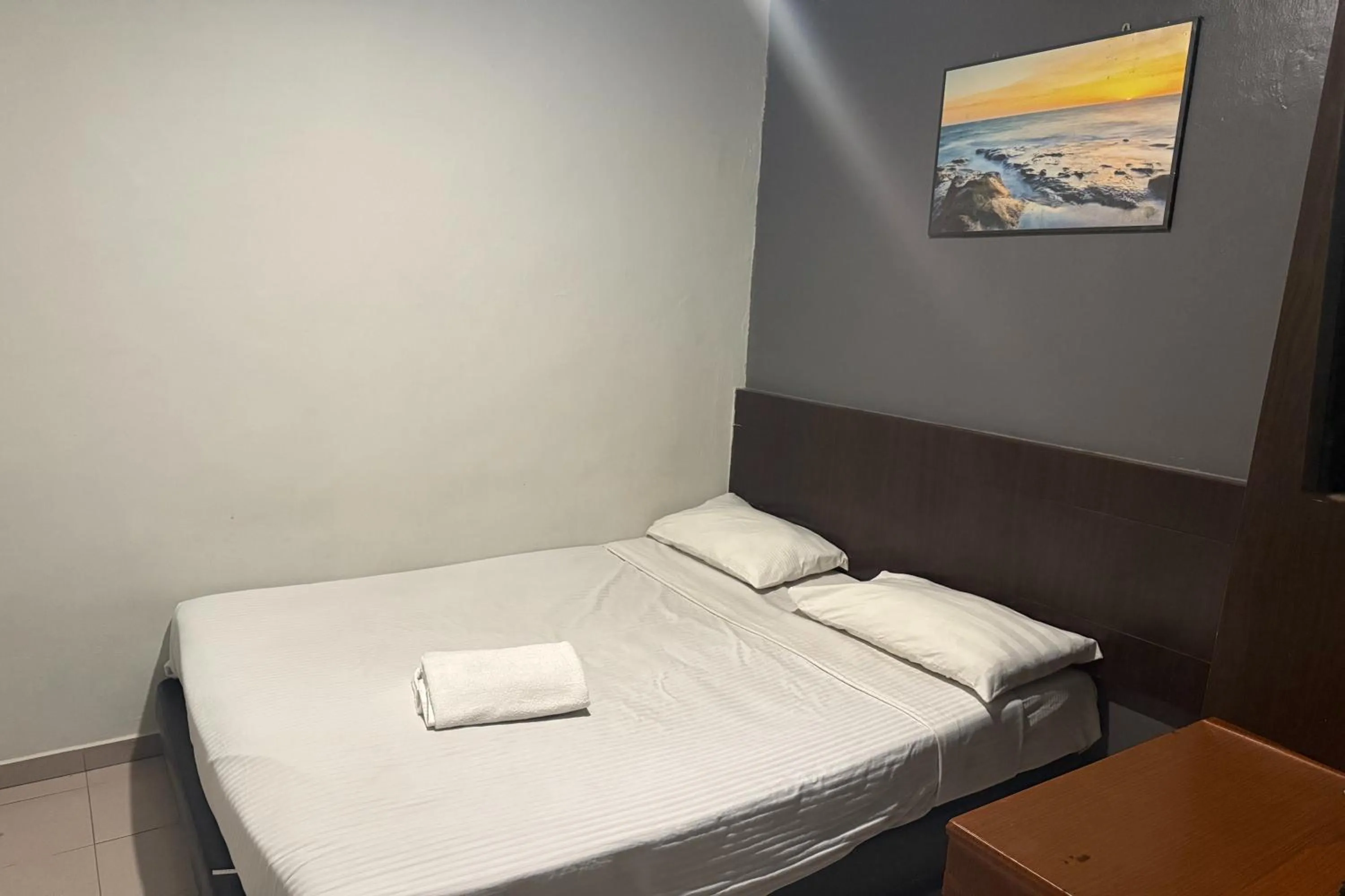 Bed in Tiong Nam Hotel