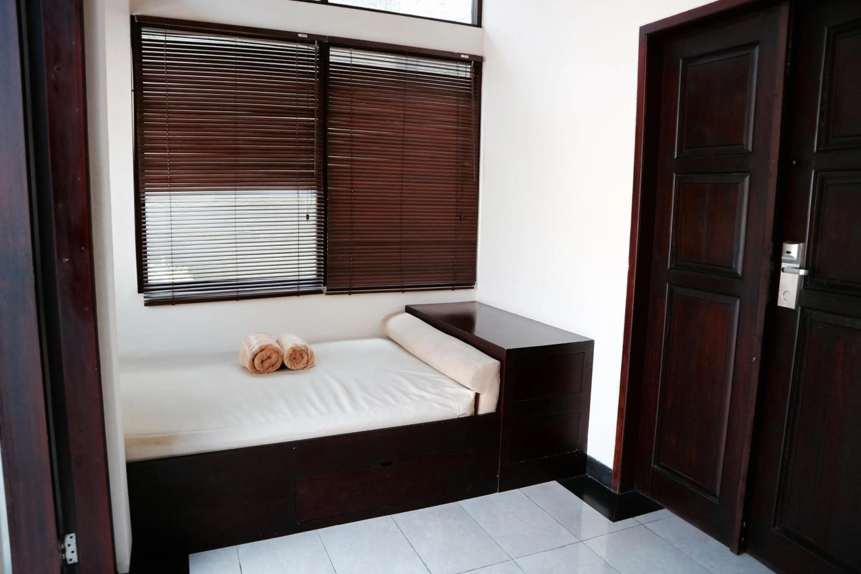 Bed in The Lagoon Bali Pool Hotel and Suites