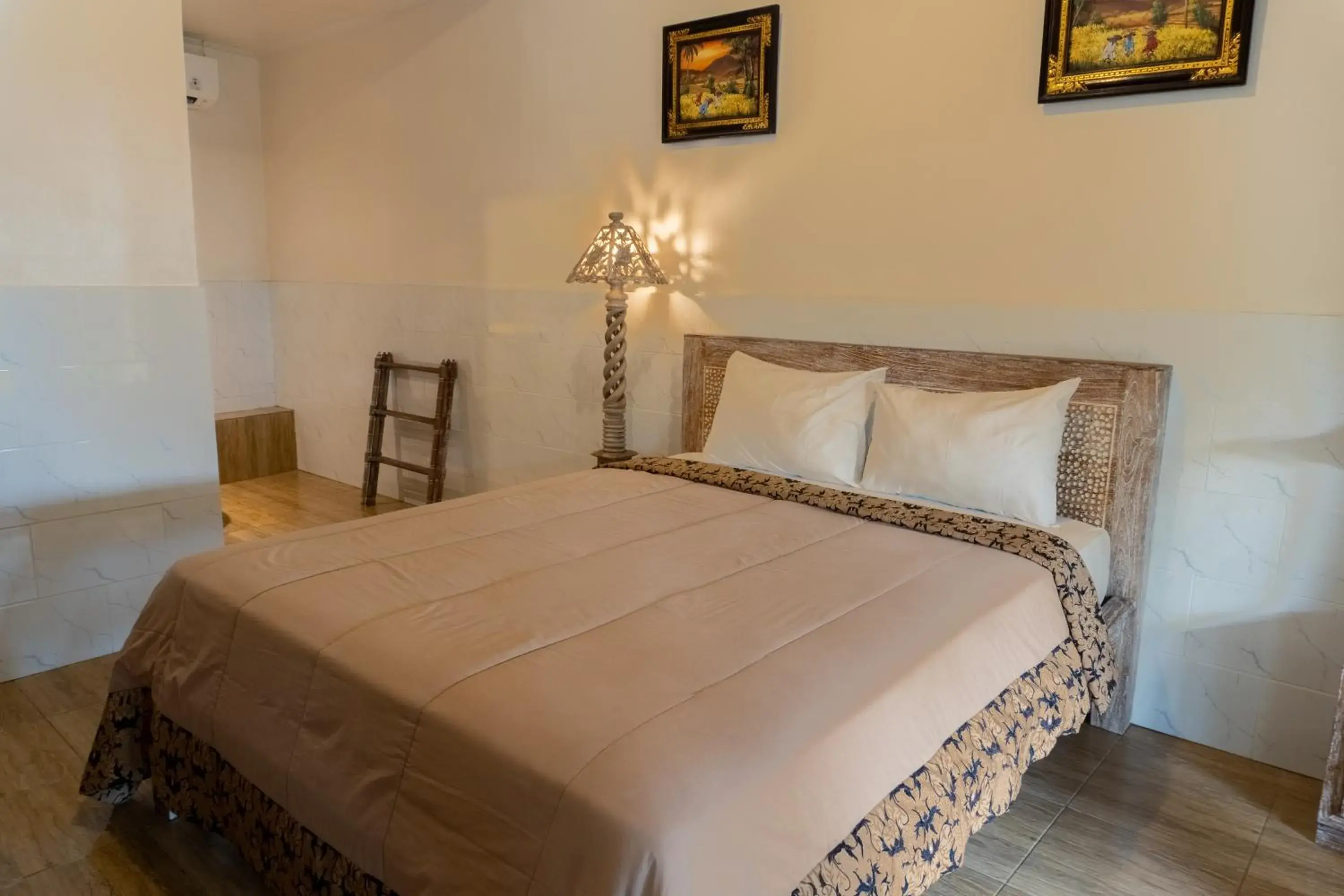 Standard Room with Air Conditioning & Television in Uma Shanty Homestay Standard Room with Air Conditioning & Television in Uma Shanty Homestay