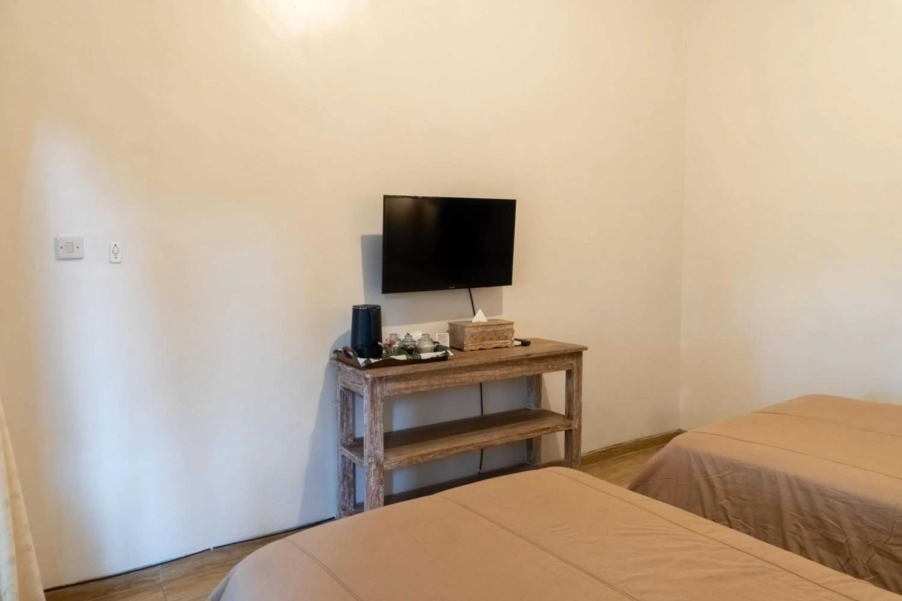 Bed in Uma Shanty Homestay