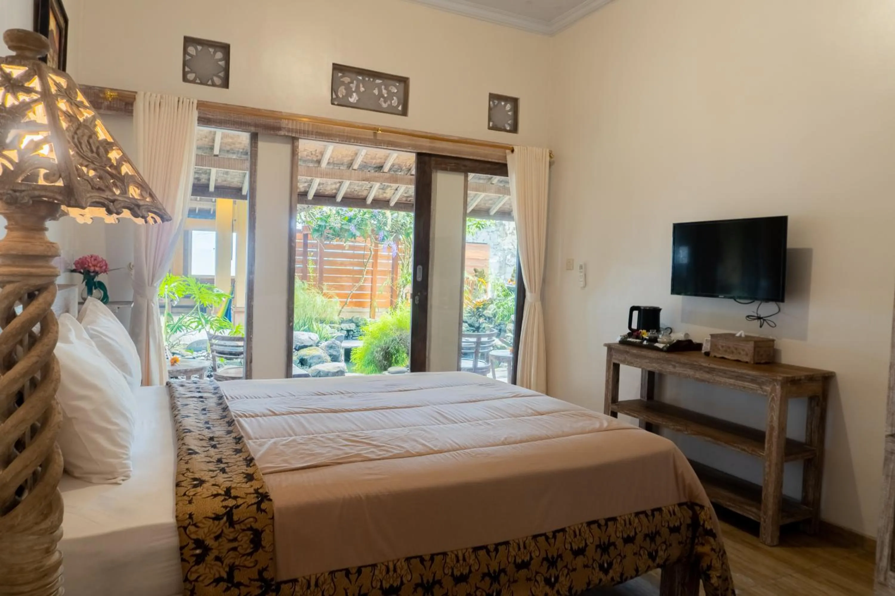 Bed in Uma Shanty Homestay