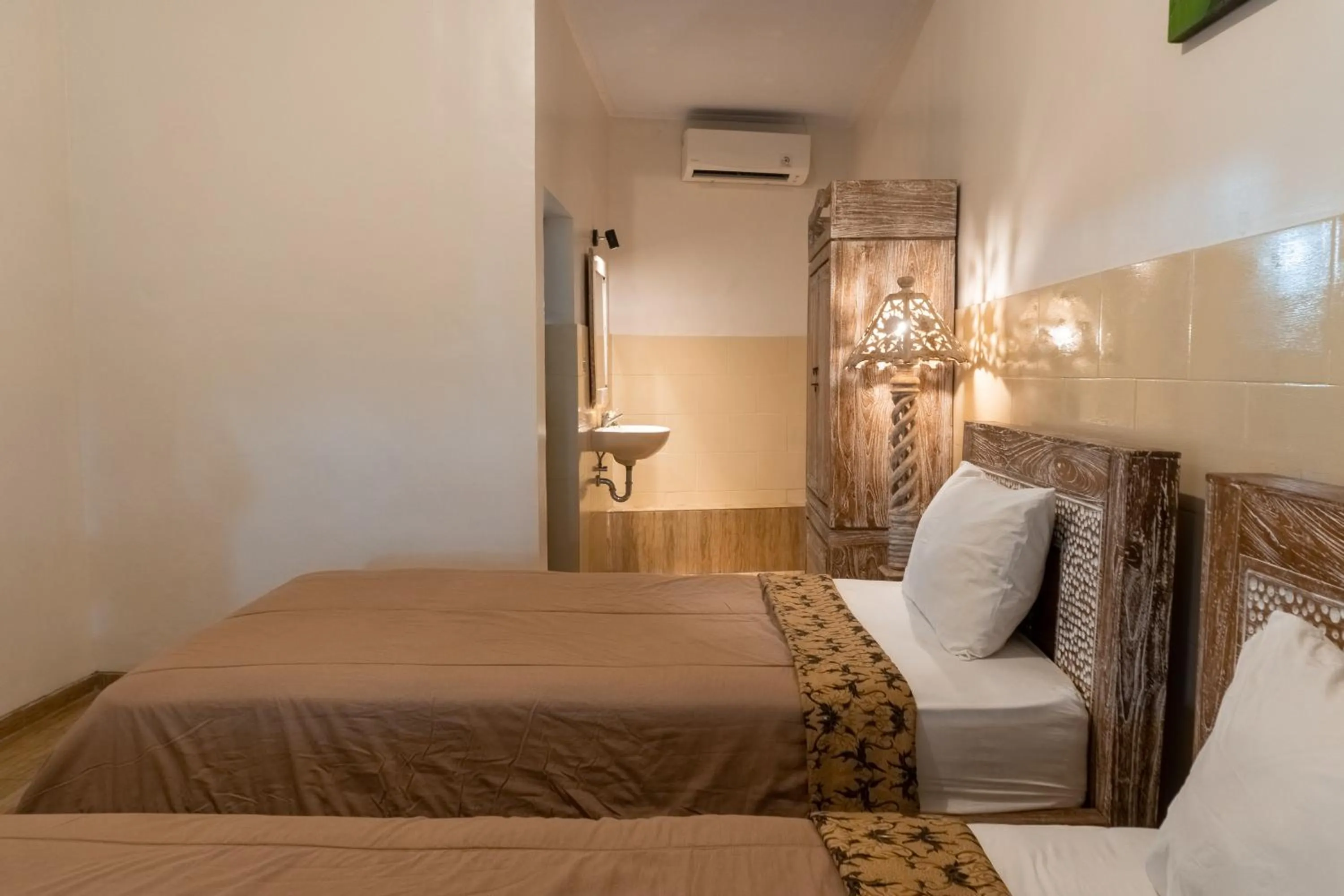 Bed in Uma Shanty Homestay