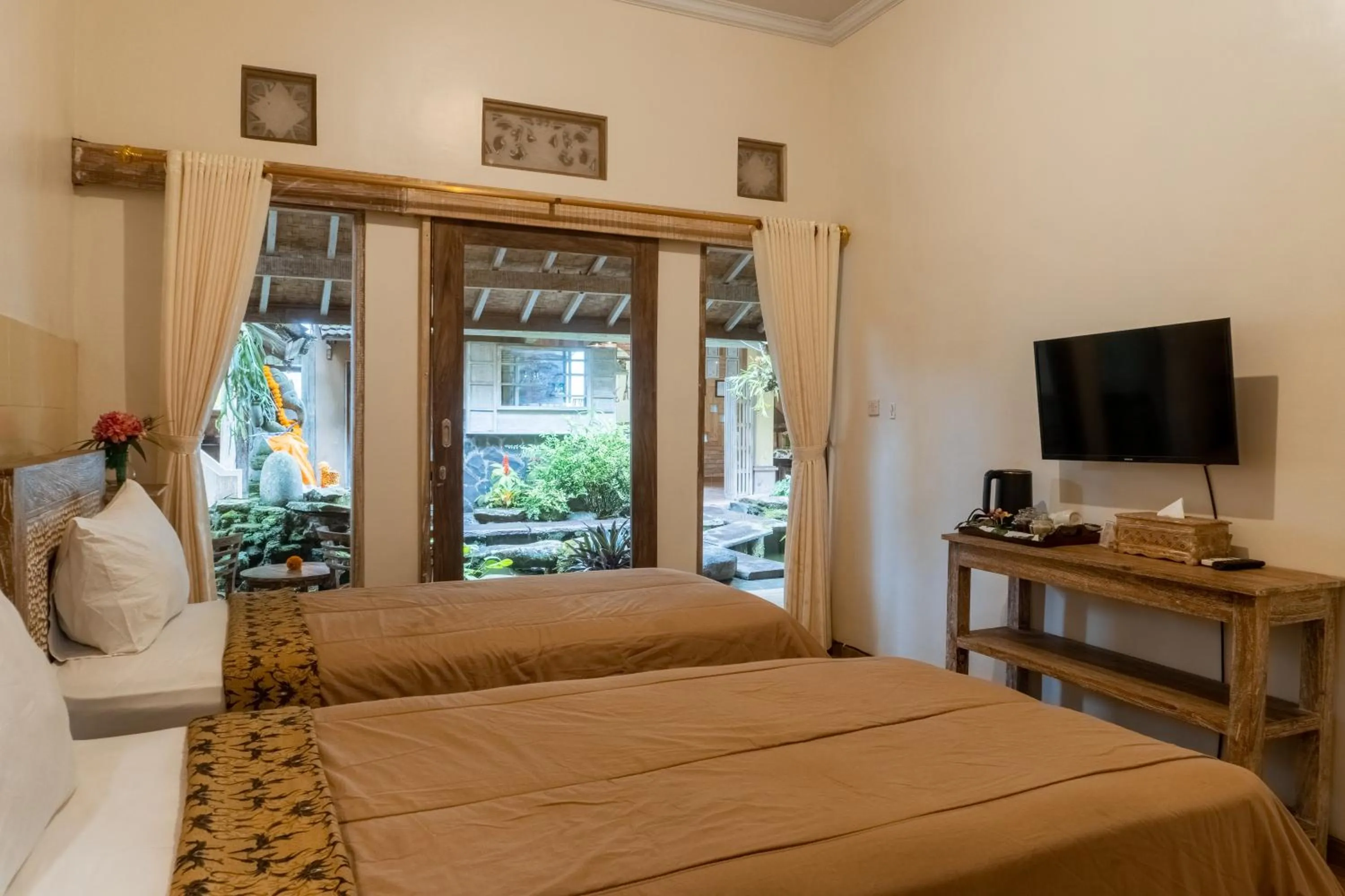 Bed in Uma Shanty Homestay