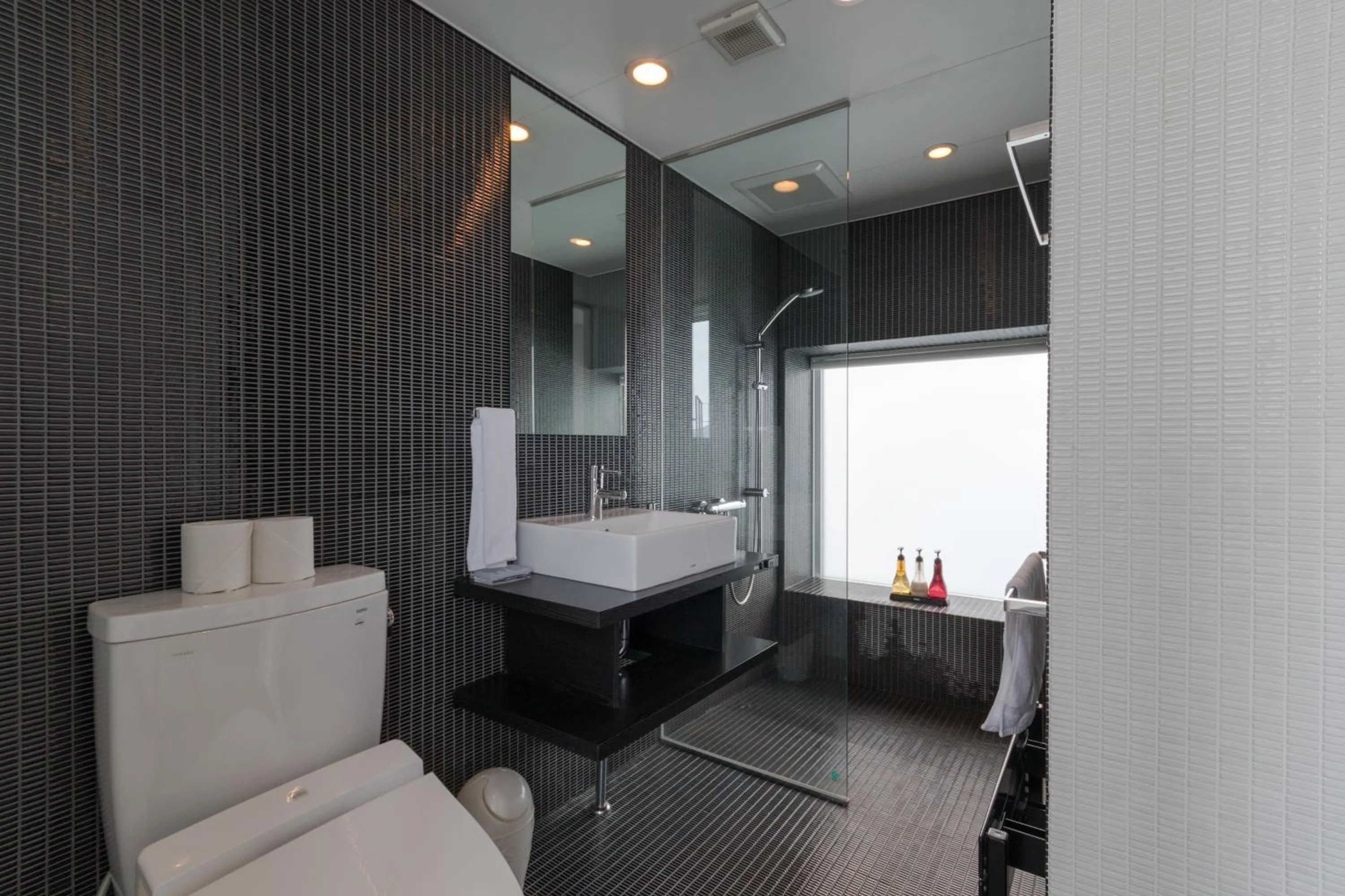 Bathroom, Bed in Kira Kira Suites by H2 Life