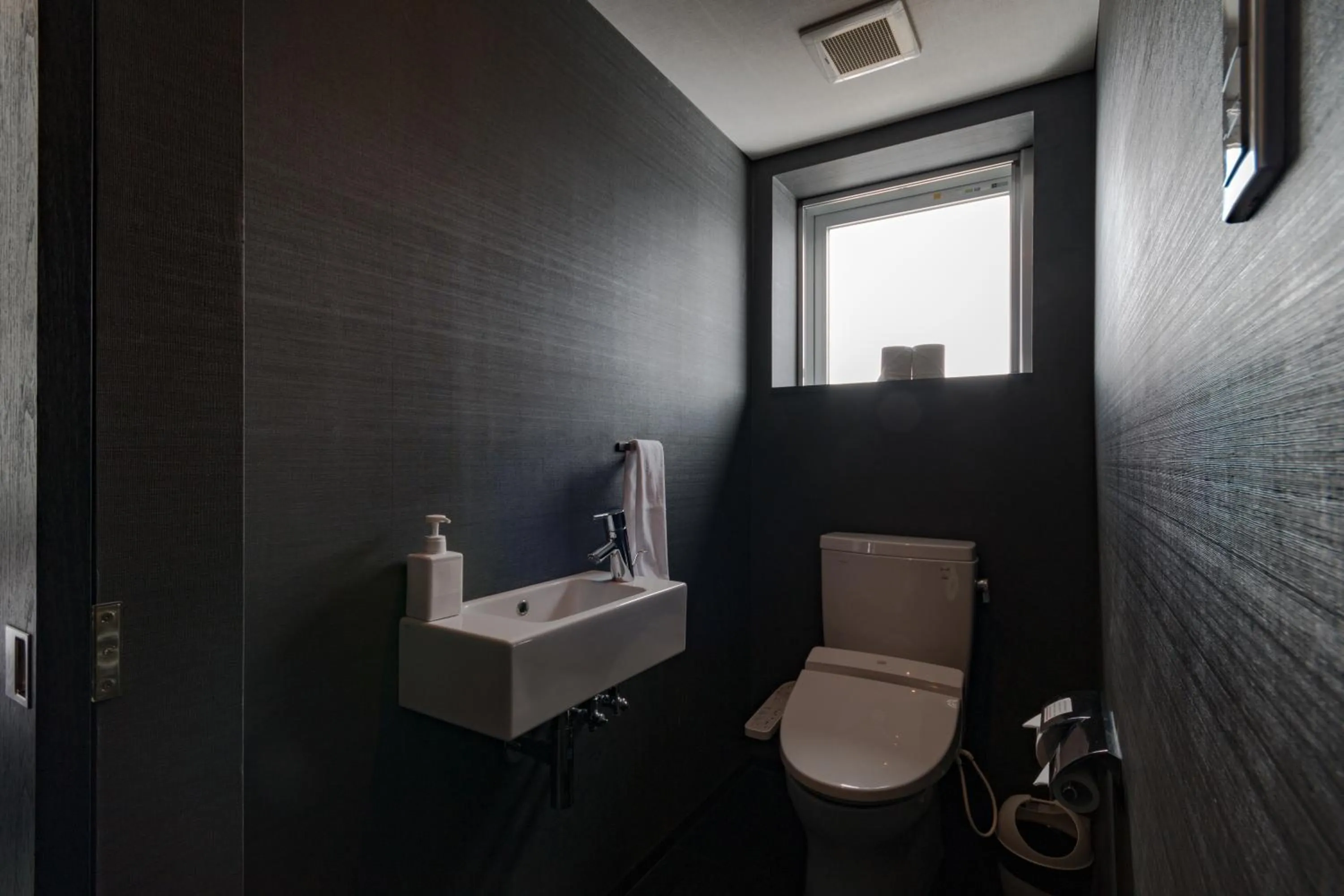 Bathroom in Kira Kira Suites by H2 Life