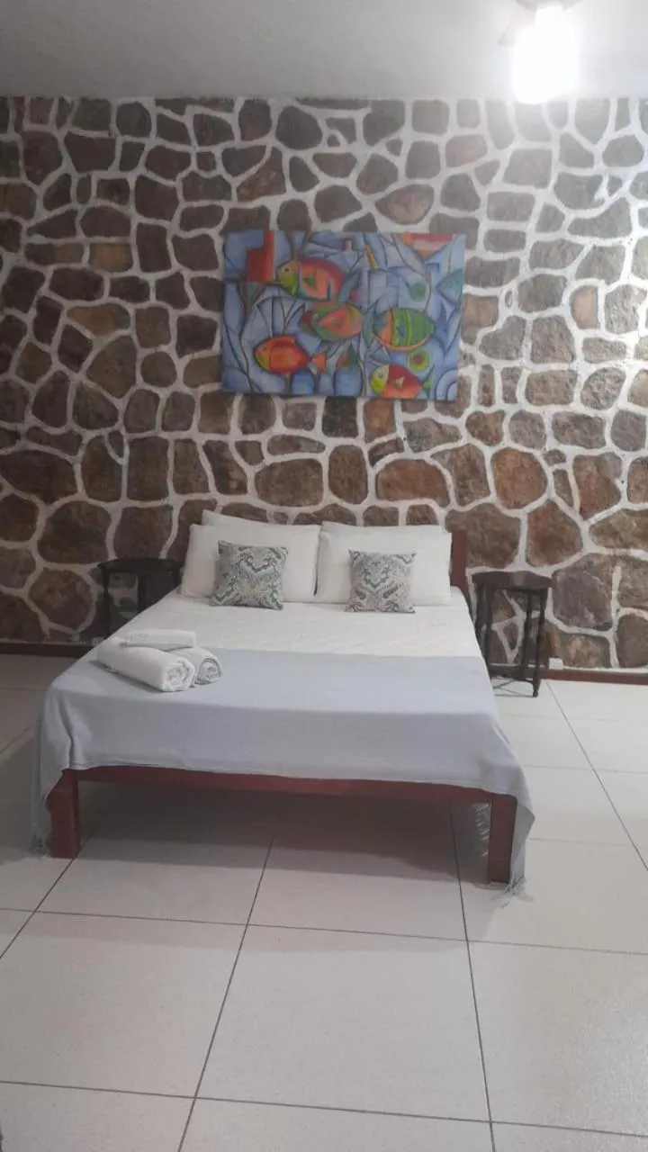 Bed in Pousada Recanto da Villa