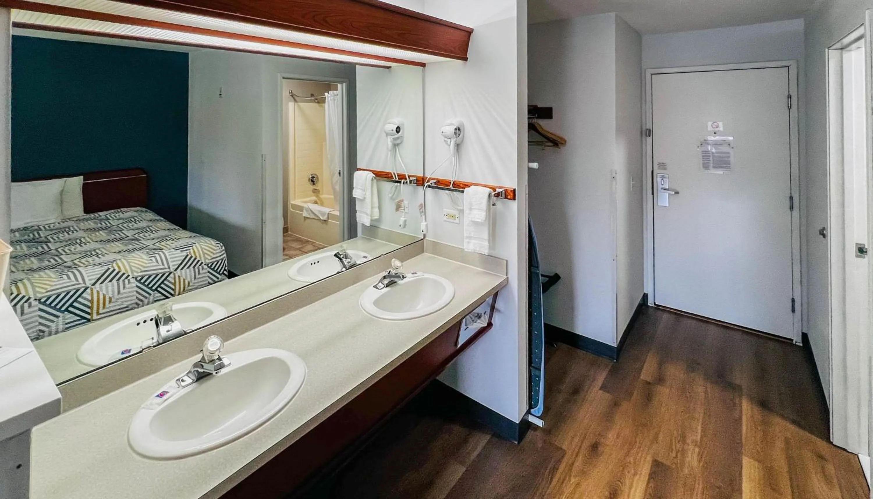 Bathroom, Bed in Studio 6 Suites Portland OR I-5 OHSU