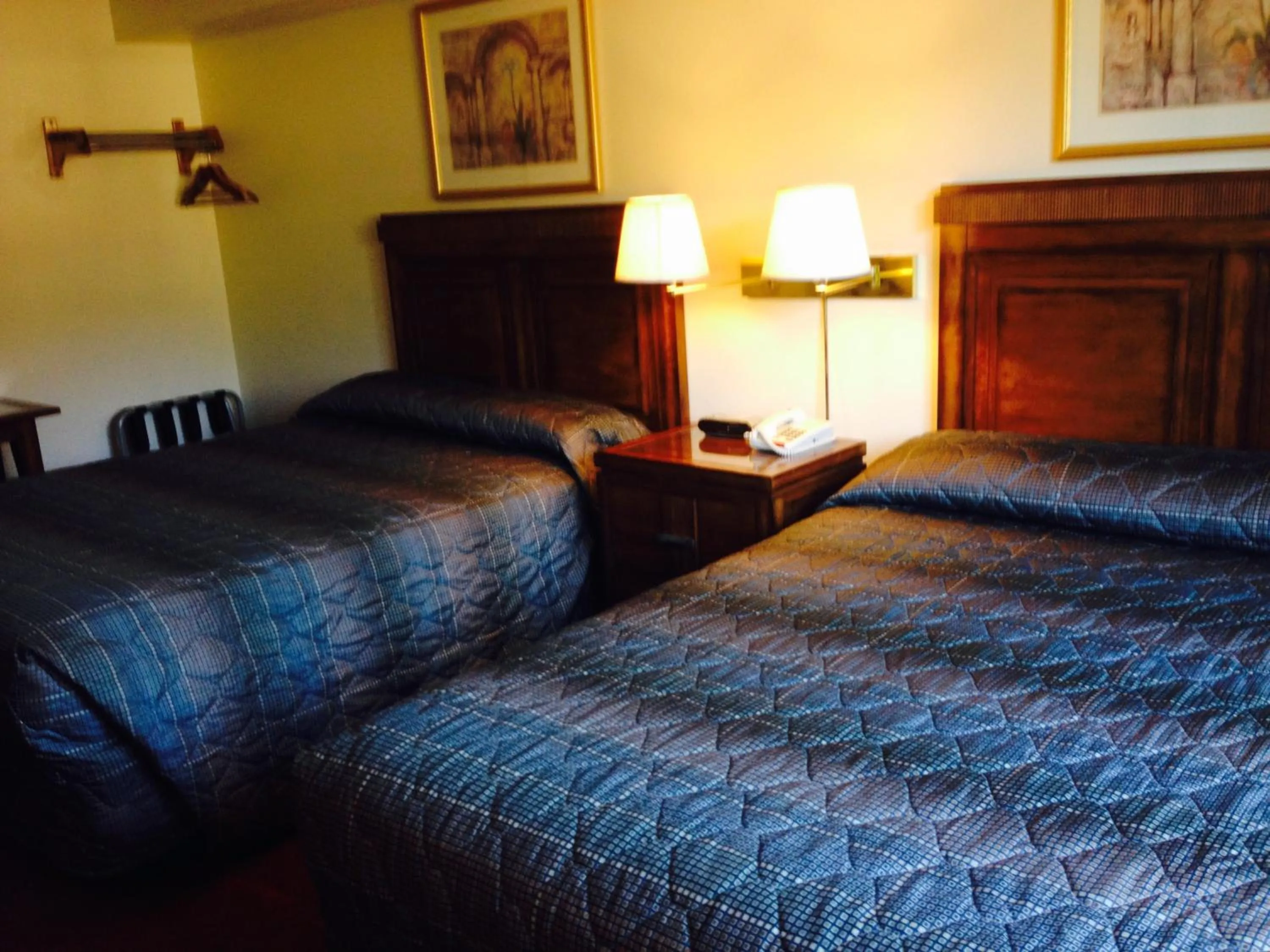 Bed in Bay City Inn