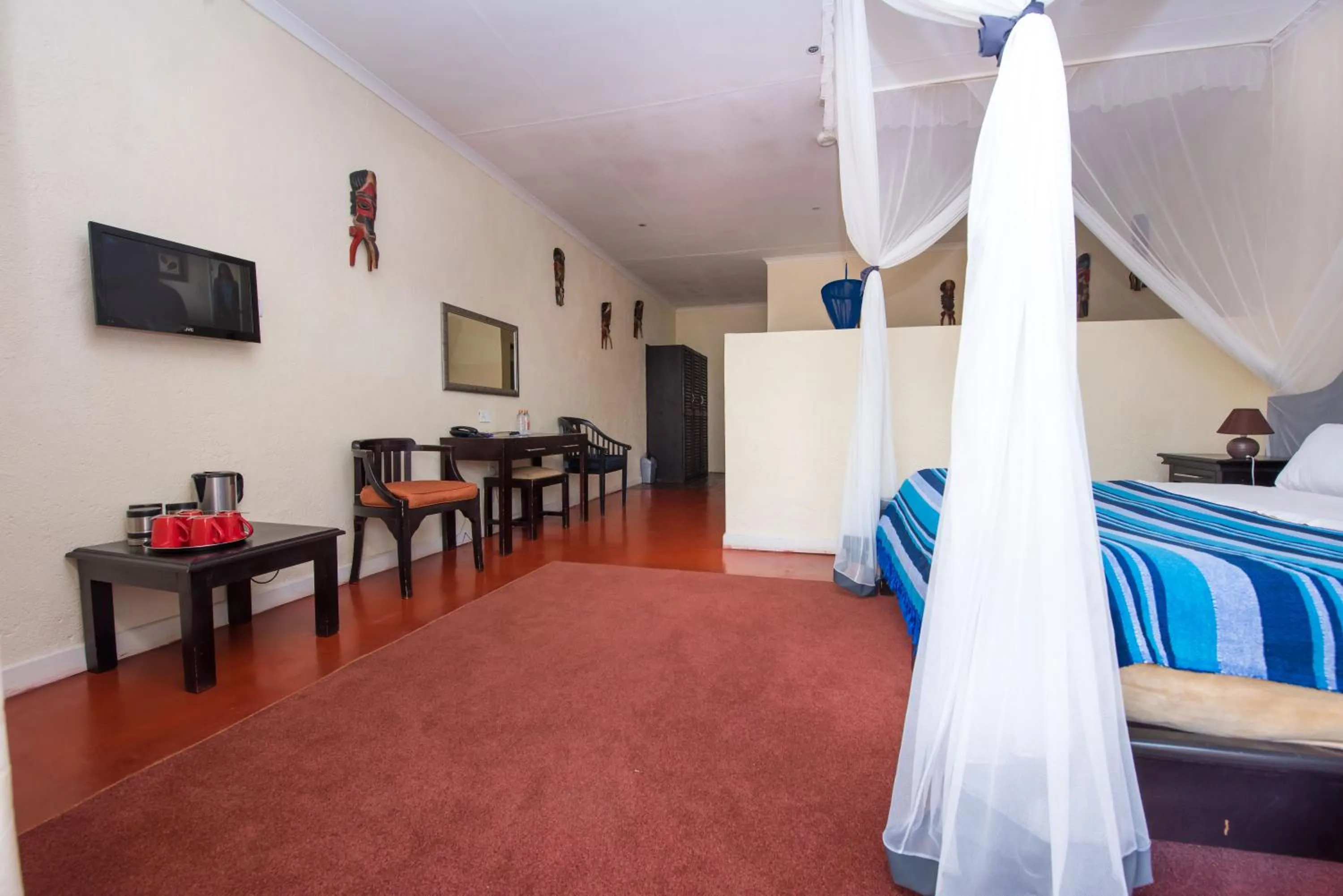 Bed in Game Haven Lodge