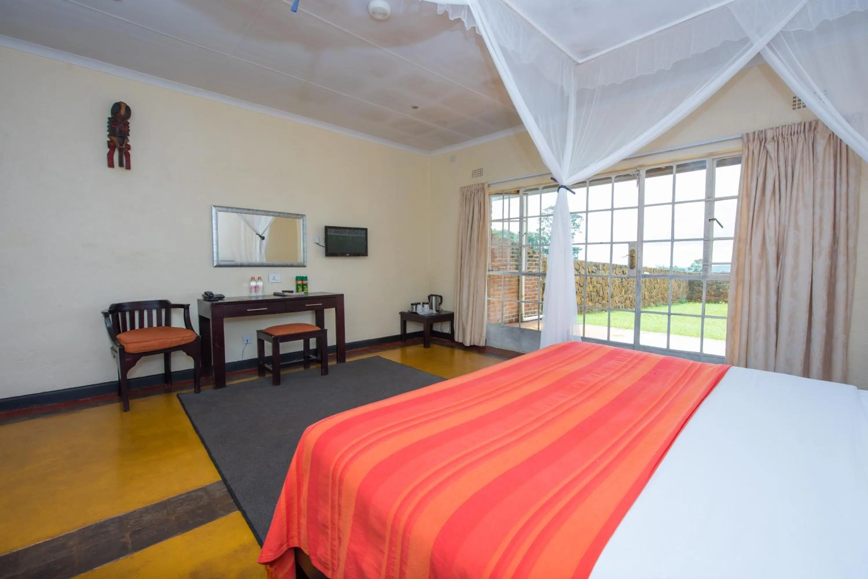 Bed in Game Haven Lodge